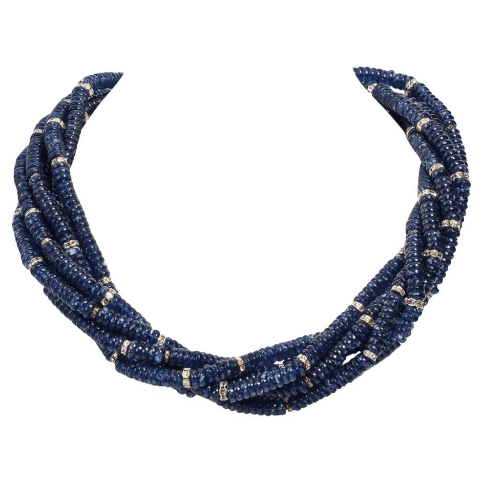 Art Deco Style Costume Jewelry Bergdorf Goodman Old Stock French Faux Sapphire Diamante Rhodium Sterling Rondel Torsade Necklace
This exquisite chic, one-of-a-kind French faux gorgeous blue sapphire beads and diamante rondel seven-strand twist
