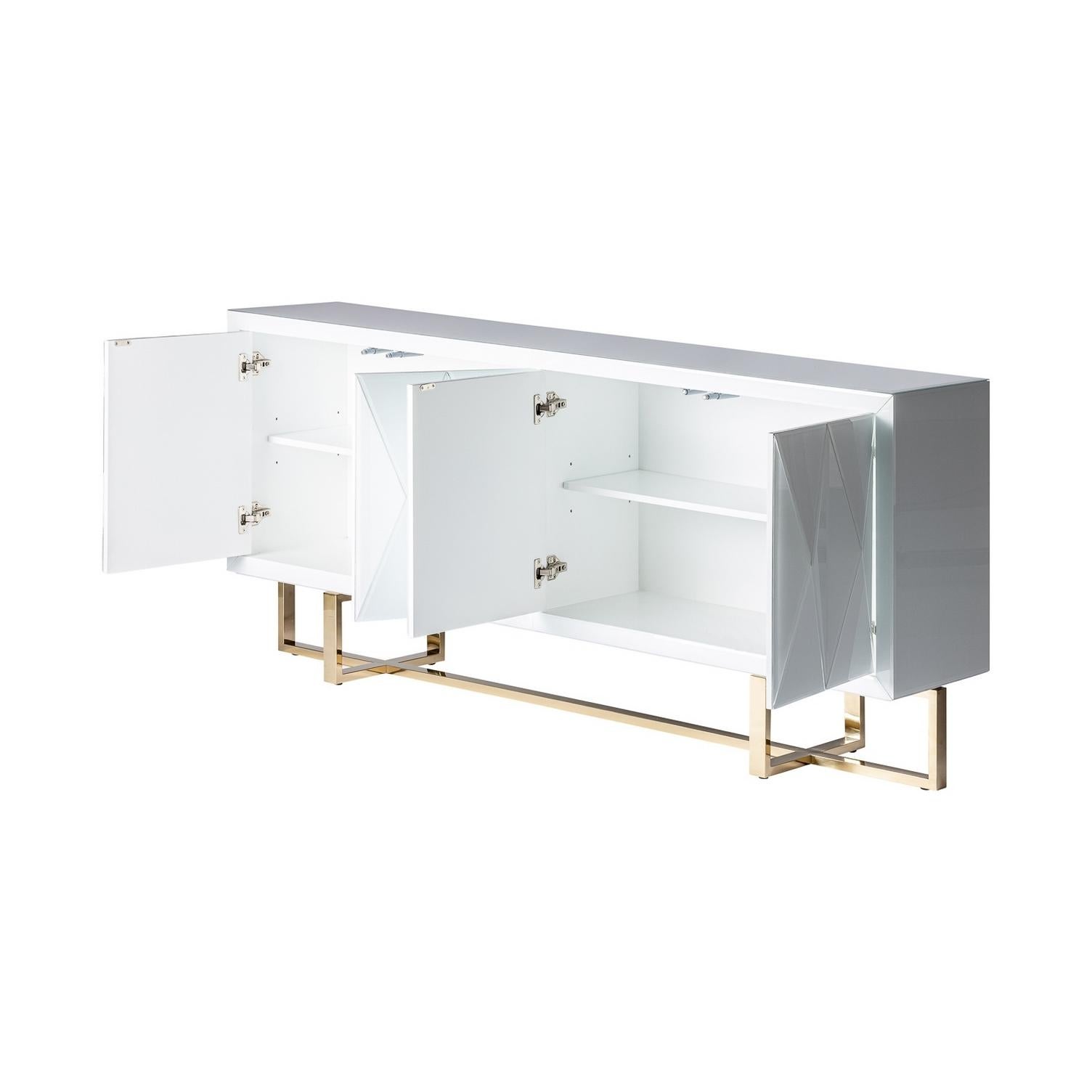 Sparkling and sophisticated sideboard with aerial gilt metal feet and an all-in white colored glass and graphic panel doors opening on shelves spaces. Harmonious lines, brilliant and design.