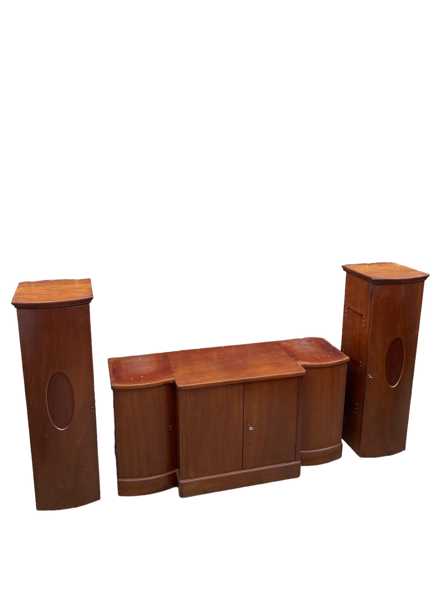 Mid 19TH Century Art Deco style Mahogany Biedermeier from Austria Wall Cupboard,  CIRCA 1920'S. This wonderful piece has one lower level centre cupboard with two doors and one shelf with two additional plynth cupboards with a further two shelves in