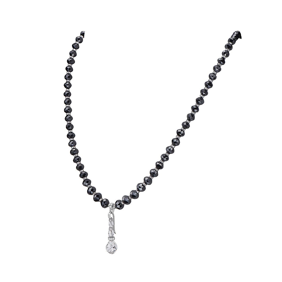 This Art Deco style pendant necklace features 95 carats of black diamonds and 3.5 carats of G-H SI1-2 white briolette diamonds with an 18K white gold clasp. Gemological Appraisal Laboratory of America, Inc. report included. Report No.