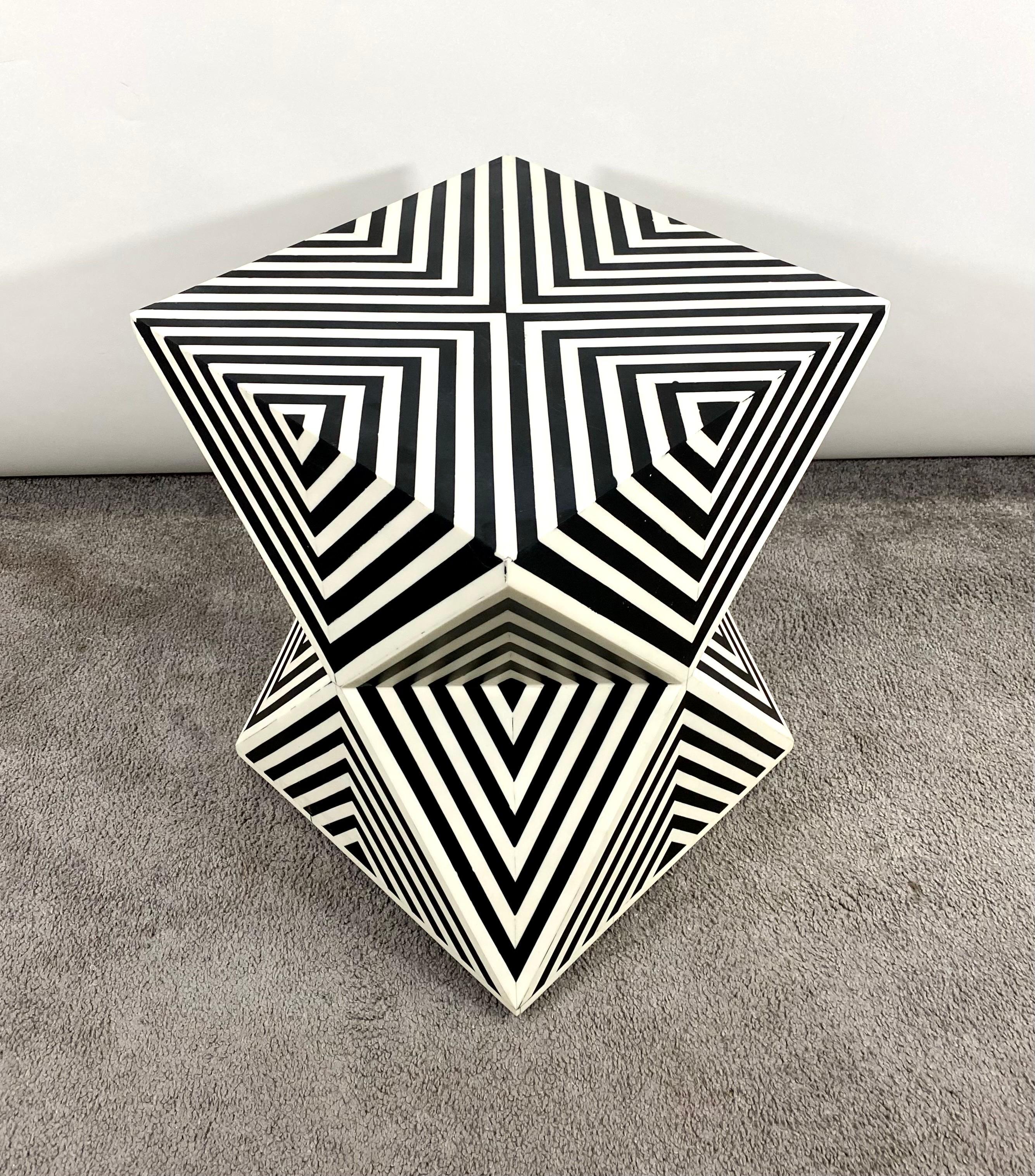 The Art Deco style sculptural side, end table or stool features a triangle / diamond design narrowing in the middle which creates an amazing pyramid shape. The sculptural table or stool is solid and handcrafted of high quality resin and wood. 
This