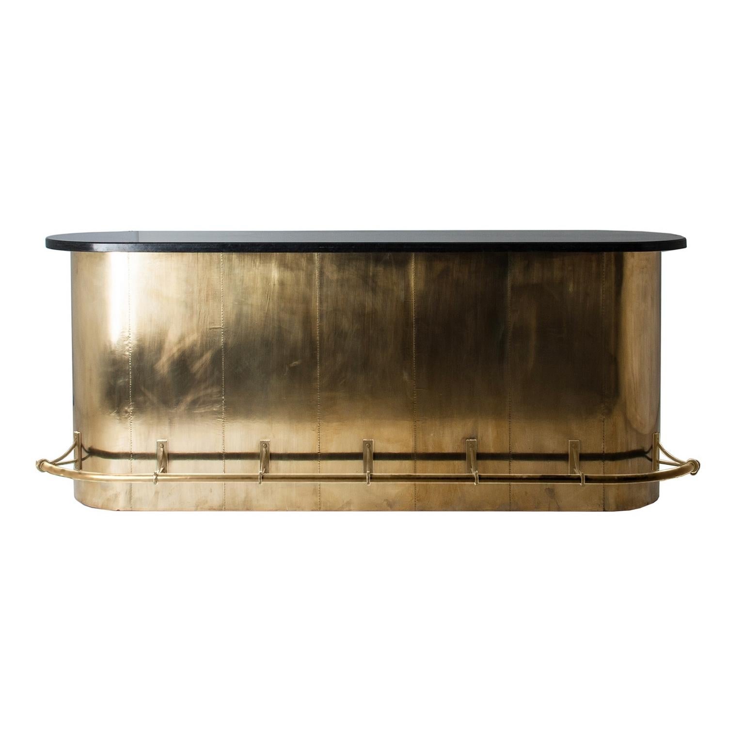Oval black bevelled marble stone tray, curved and rounded lines bar or counter table sparkling and sophisticated with black lacquered wooden and brass finishes, opening shelves spaces on the other side. Amazing!