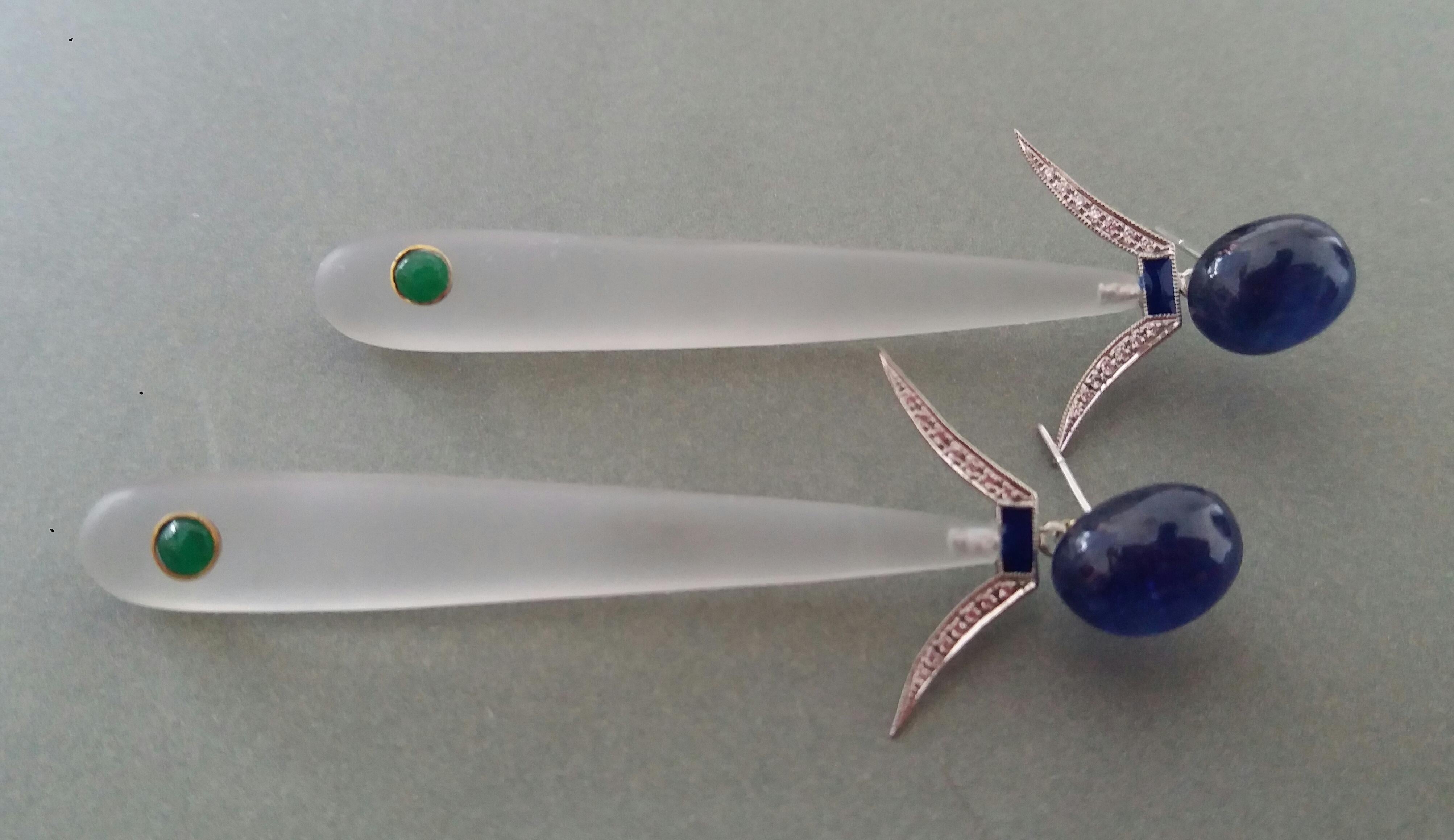 2 Oval Blue Sapphire cabs are on top, middle parts in white gold ,14 round full cut diamonds,blue enamel,2  Rock Crystal  plain drops 60 mm long with small Emerald round cabochons

In 1978 our workshop started in Italy to make simple-chic Art Deco