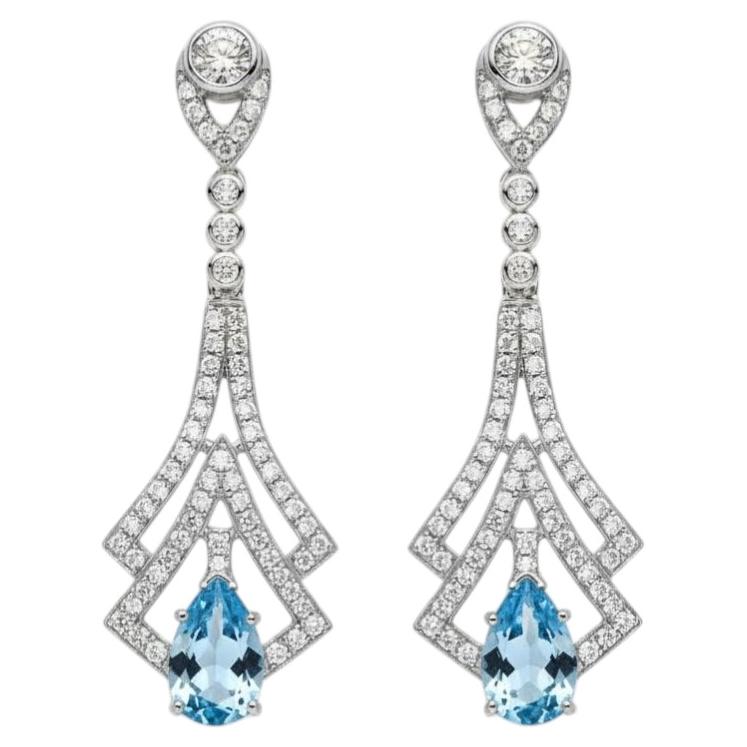 Orecchini a goccia in stile Art Deco con topazio blu e topazio incolore argento, oro