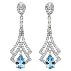 Orecchini a goccia in stile Art Deco con topazio blu e topazio incolore argento, oro