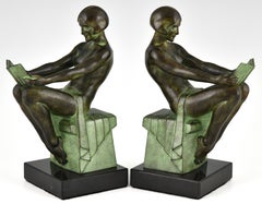 Art Deco style bookends reading nudes Delassement by Max Le Verrier.
