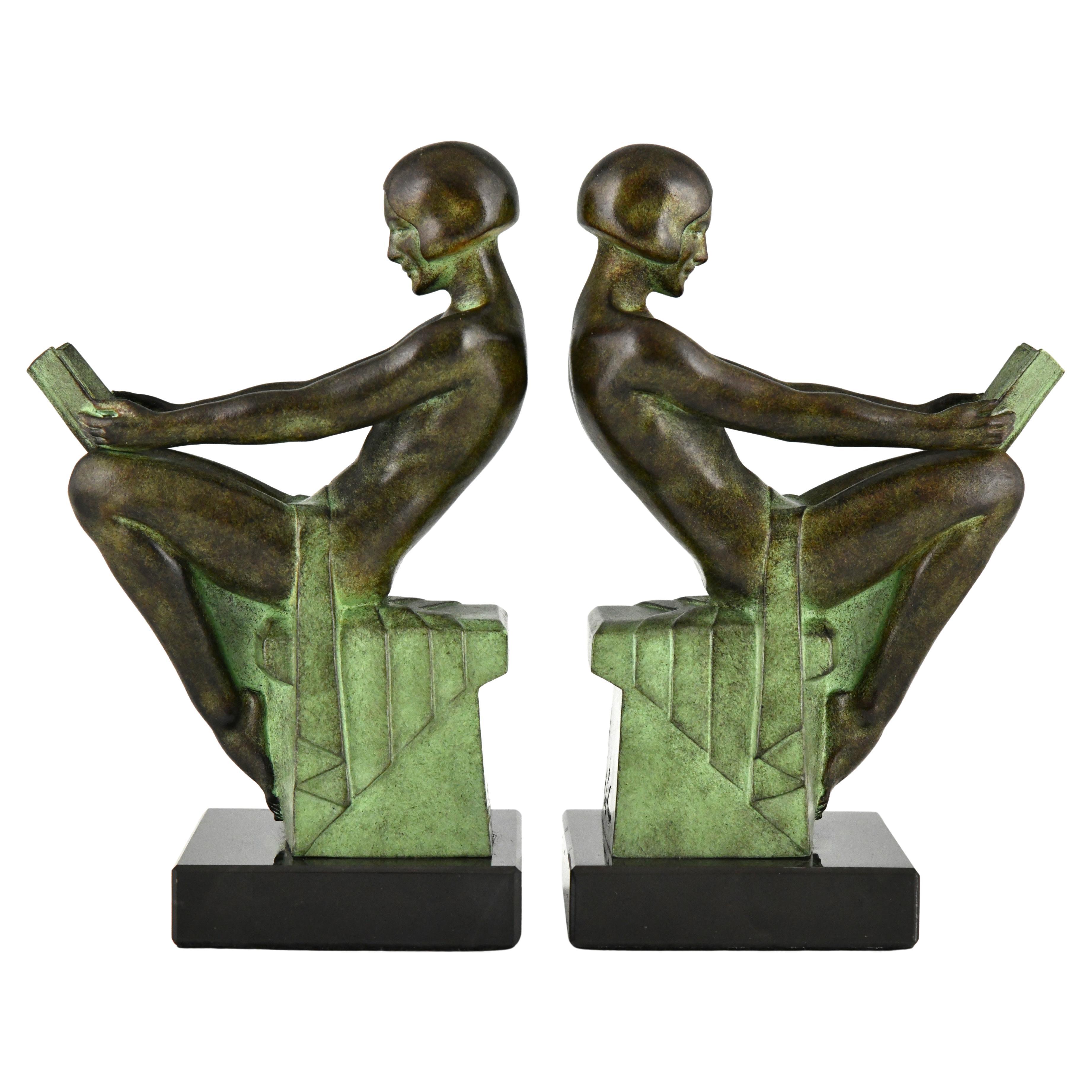 Art Deco style bookends reading nudes Delassement by Max Le Verrier.