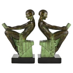 Art Deco style bookends reading nudes Delassement by Max Le Verrier.