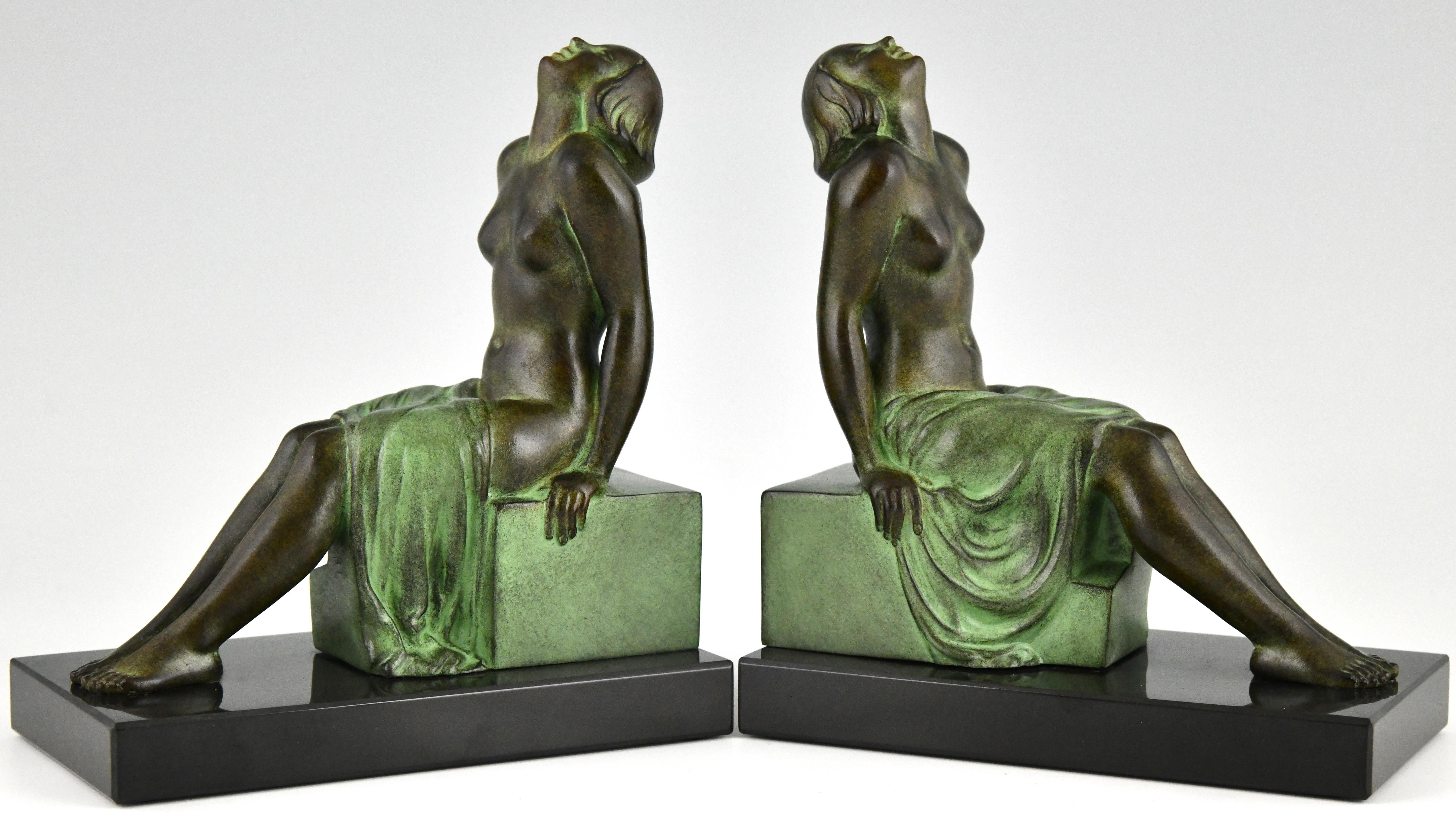 Art Deco style bookends seated nudes Insouciance Janle for Max Le Verrier. 
With the Le Verrier foundry seal. 
Design 1930.
Posthumous, contemporary cast. 

Literature:
Max le Verrier, un esprit Art Déco.  
Bénédicte Wattel & Damien Blanchet Le