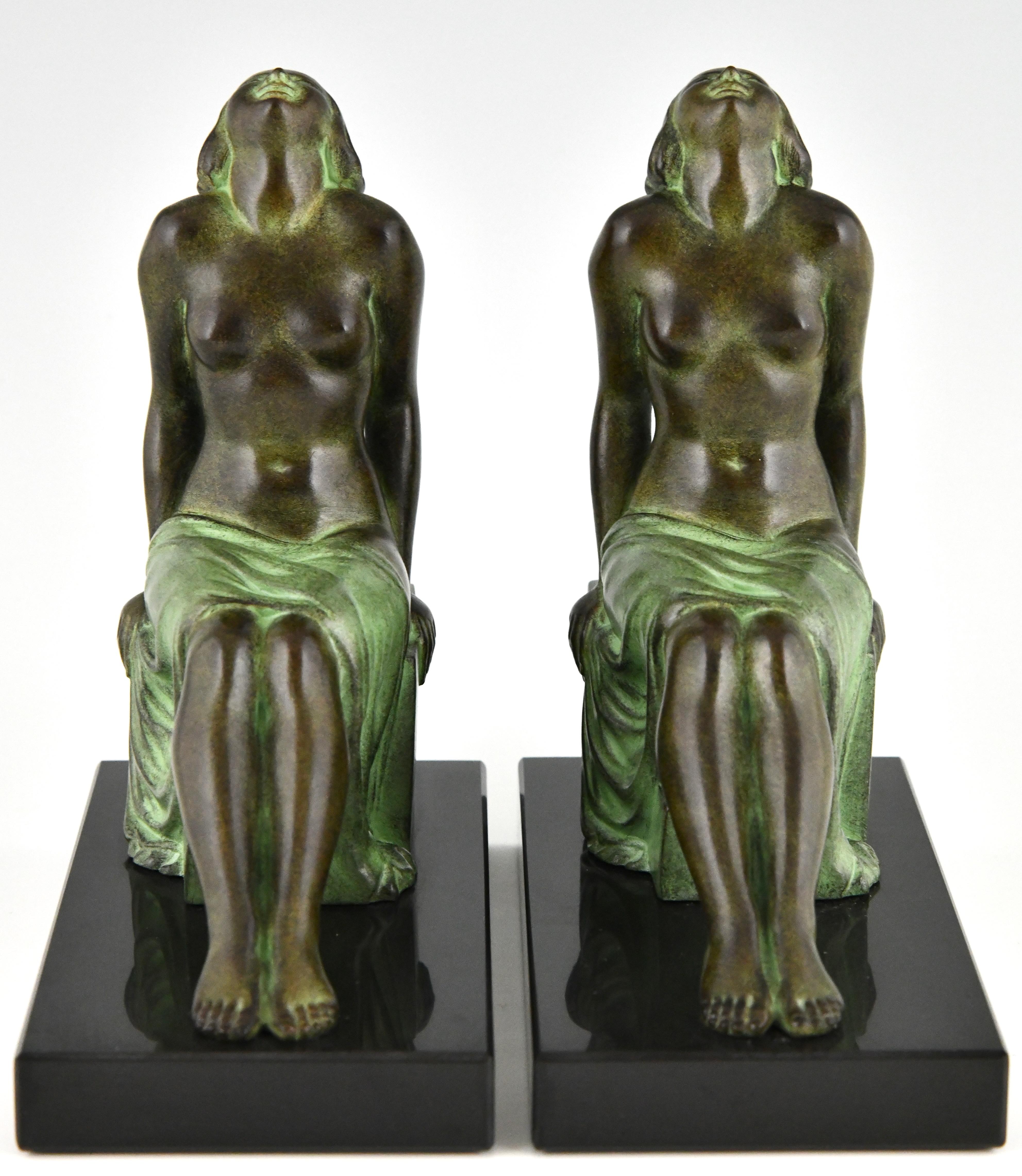 French Art Deco style bookends seated nudes Insouciance Janle for Max Le Verrier. For Sale