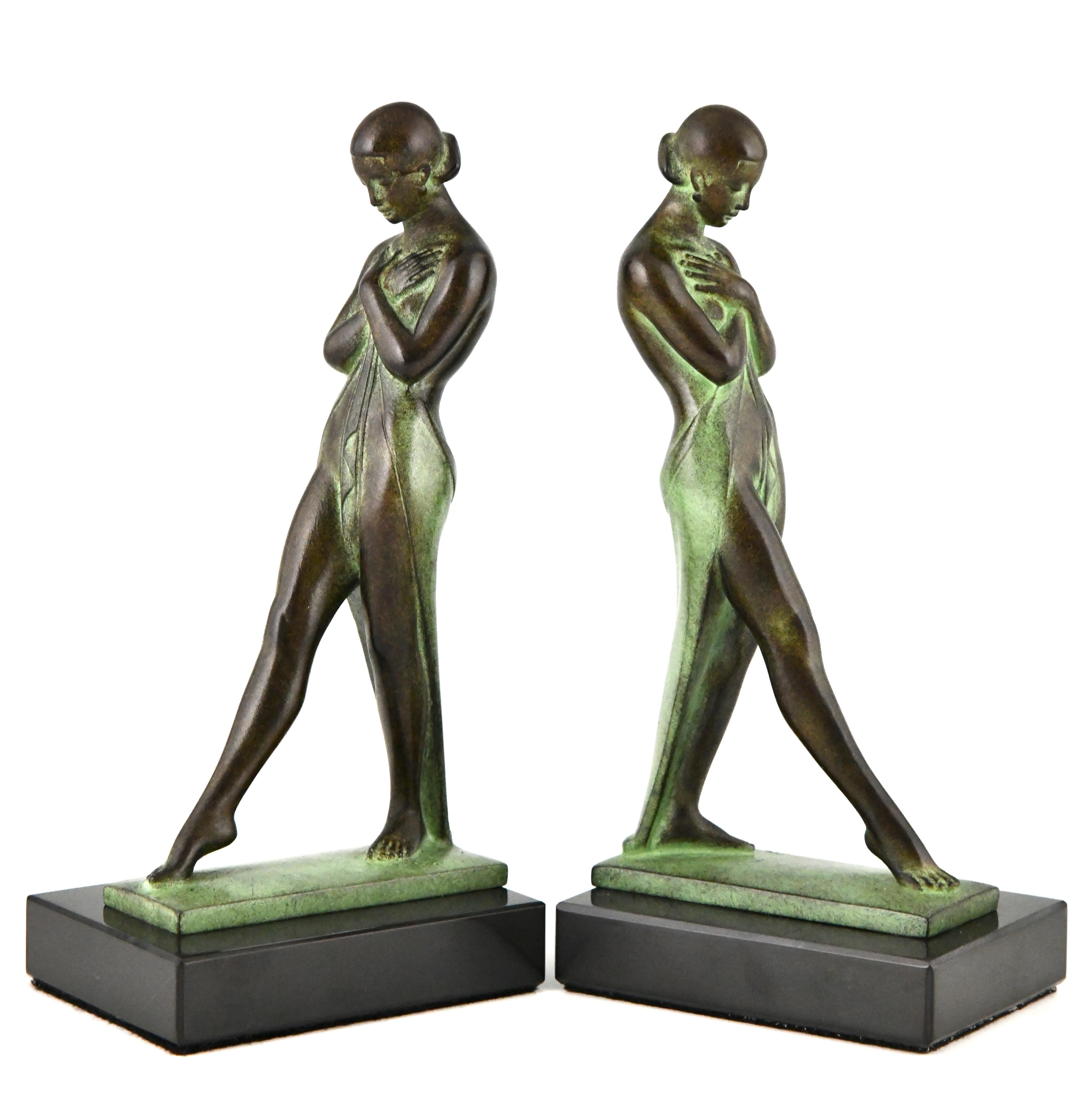 Art Deco style bookends standing nudes Meditation signed Fayral, pseudonym of Pierre Le Faguays.
With the Max Le Verrier foundry seal. 
Design 1930.
Posthumous, contemporary cast. 
These bookends are illustrated in:	
Max le Verrier, un esprit Art