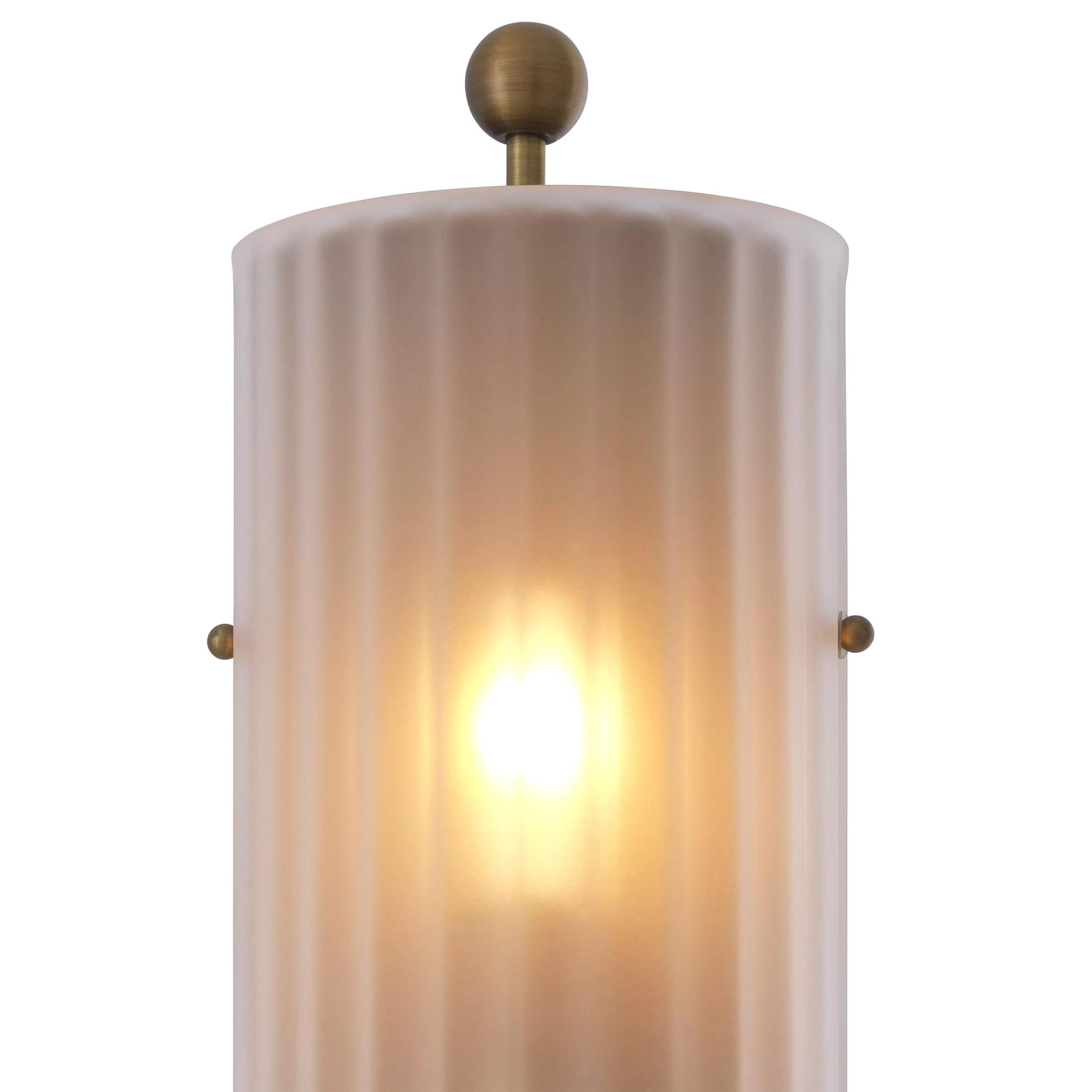 Art Deco Style Brass and glass curved wall light: elegant, presence and class all in transparency. 2 E14 light bulbs required. New item, never used.