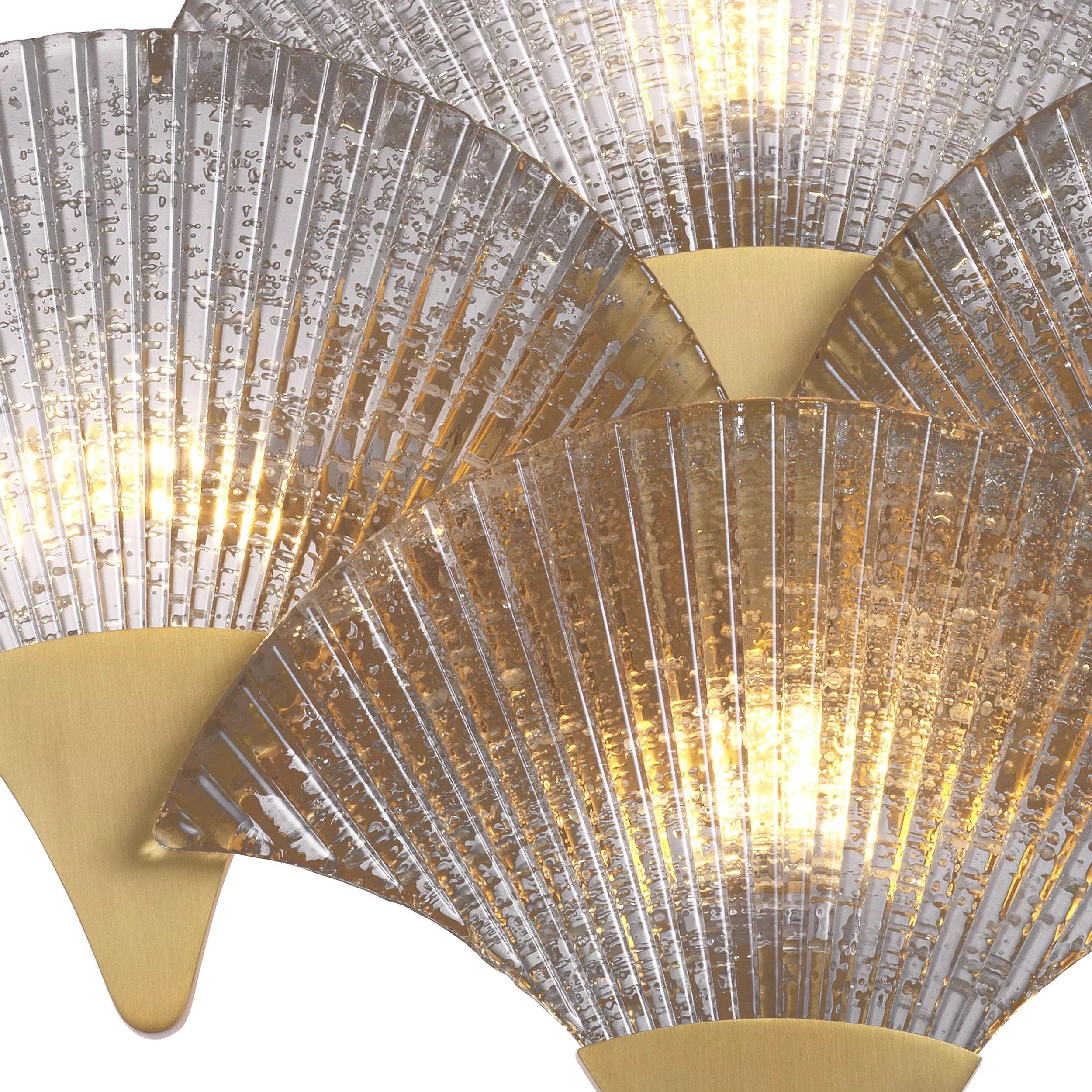 Art Deco style brass and textured glass stylizing palm tree shaped wall light: elegant, presence and class all in transparency. 4 G9 light bulbs required. New item, never used.