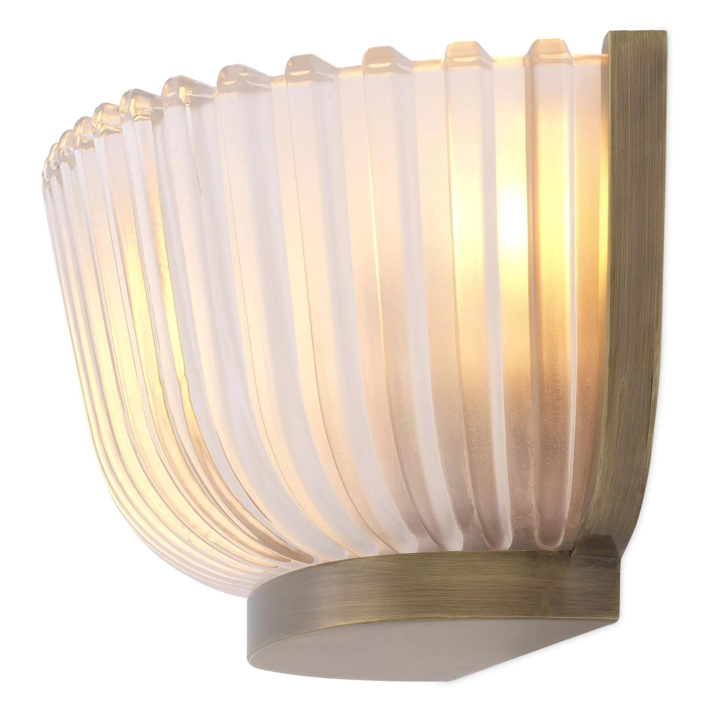 Art Deco Style Brass and glass wall light: elegant, presence and class all in transparency. 2 E14 light bulbs required. New item, never used.