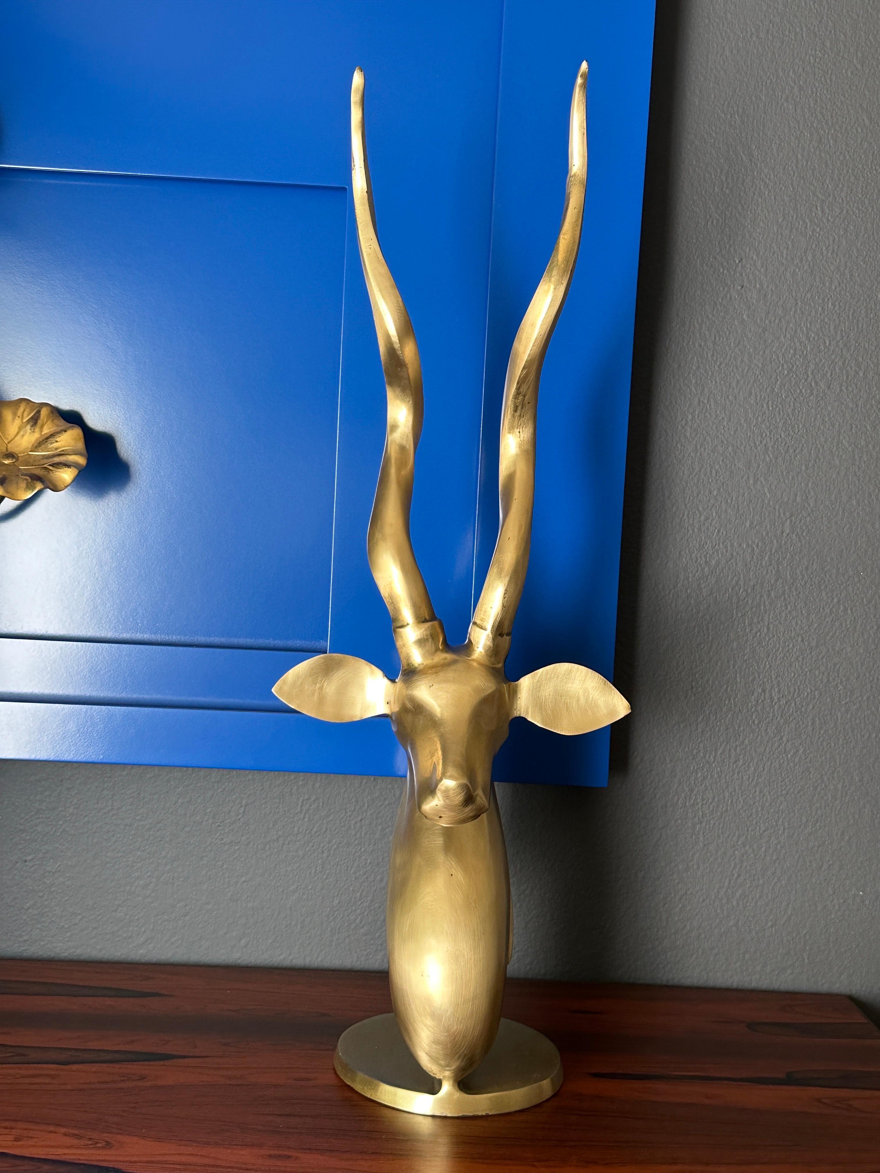 Art Deco style solid cast brass African kudu / antelope sculpture.