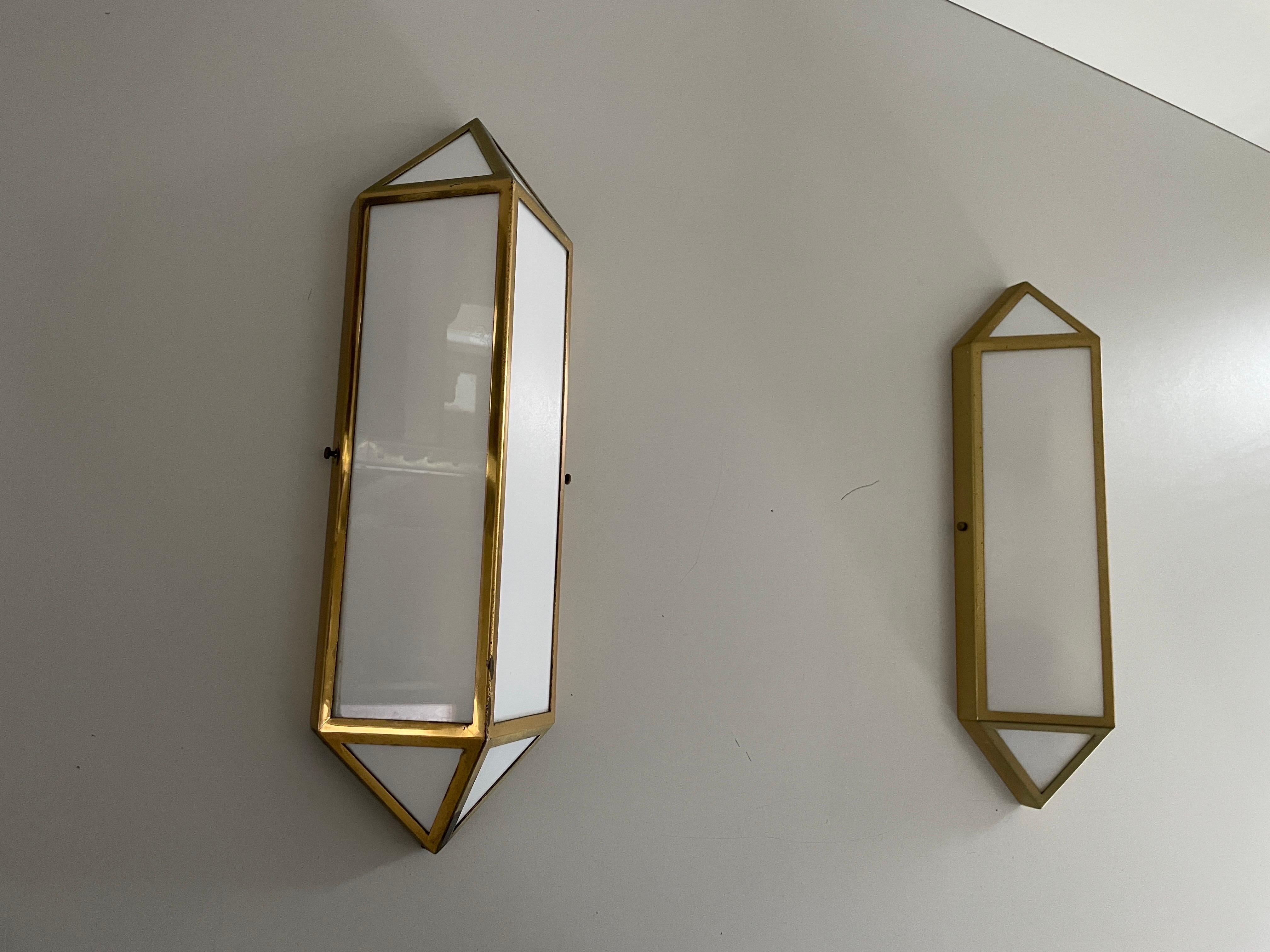 Art Deco Style Brass and Glass Pair of Sconces, 1950s, Germany

Very nice high quality wall lamps

Lamps are in very good vintage condition.

These lamps works with Bulb - 2x E14

Wired and suitable to use in all countries. (110-220