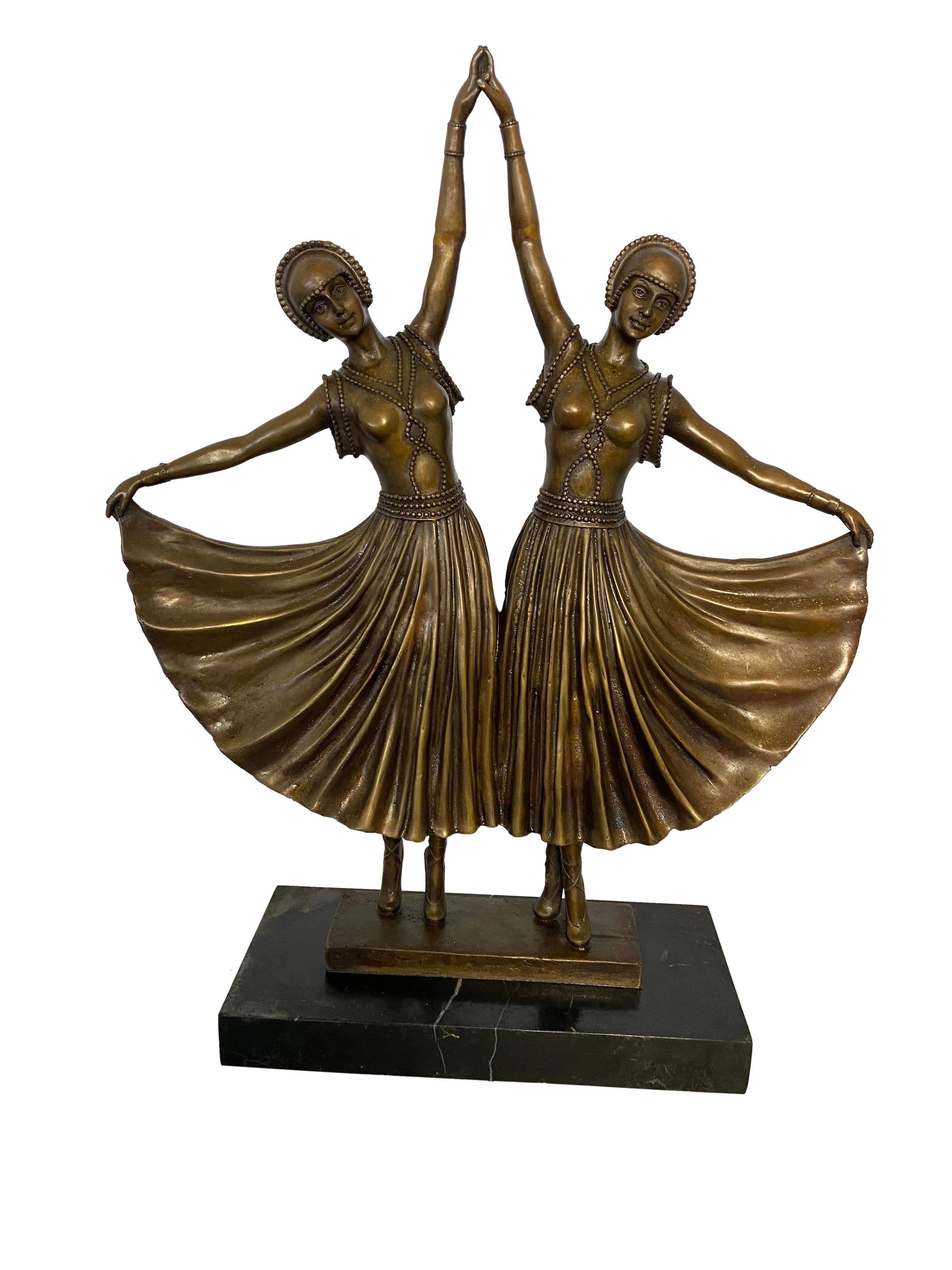 Art Deco style bronze ballerinas, 20th century. Stunning bronze ballerinas of the romantic period wearing embroidered clothing and fanned dresses. Lovely patina throughout. 

Dimensions (cm)
H60/W50/D16.