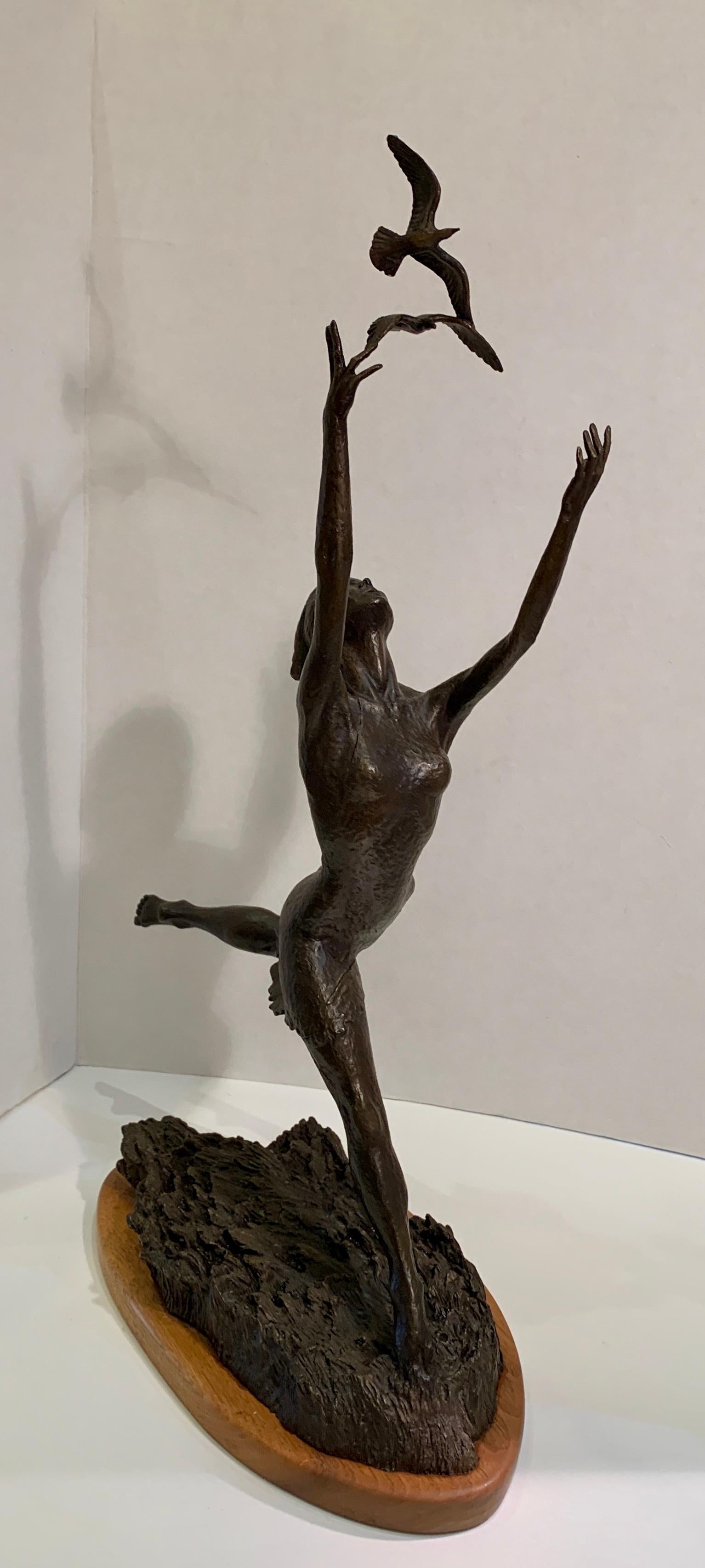 Patinated Art Deco Style Bronze Sculpture of a Woman Reaching for Seagulls by M. Young