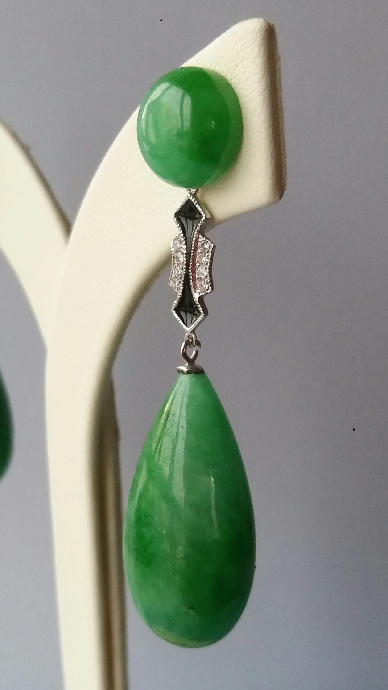 Tops are 2 round Jade buttons,middle part is in White Gold , Diamonds and Black Enamel,the bottom parts are 2  Burma Jade round drops.

In 1978 our workshop started in Italy to make simple-chic Art Deco style jewellery, completely handmade and using