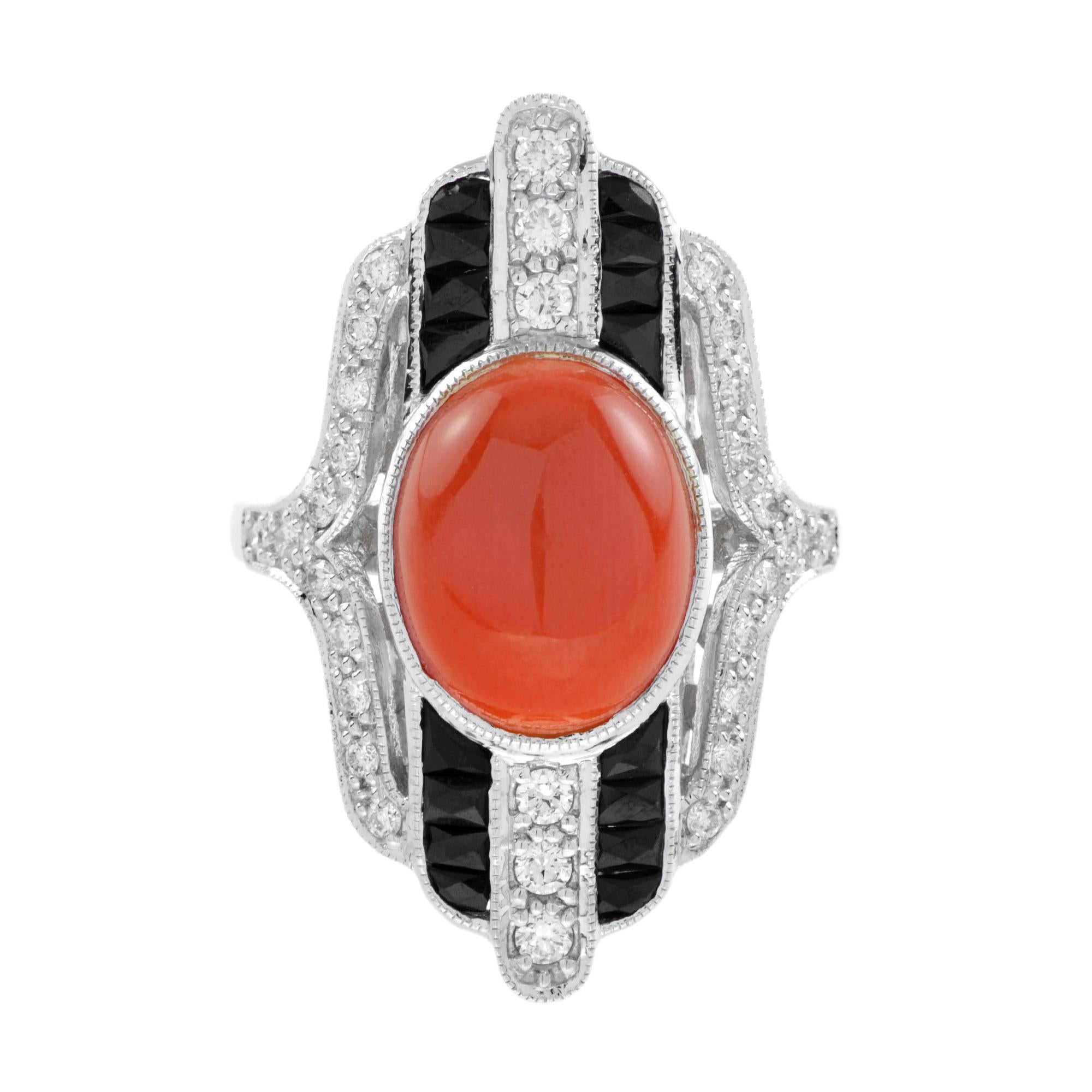 Simply beautiful and finely detailed cocktail ring center securely set with a 5 carat oval cabochon coral accented by onyx and diamond. Handcrafted in 14k white gold. The perfect accessory for the modern woman! Ready to wear from day to evening with