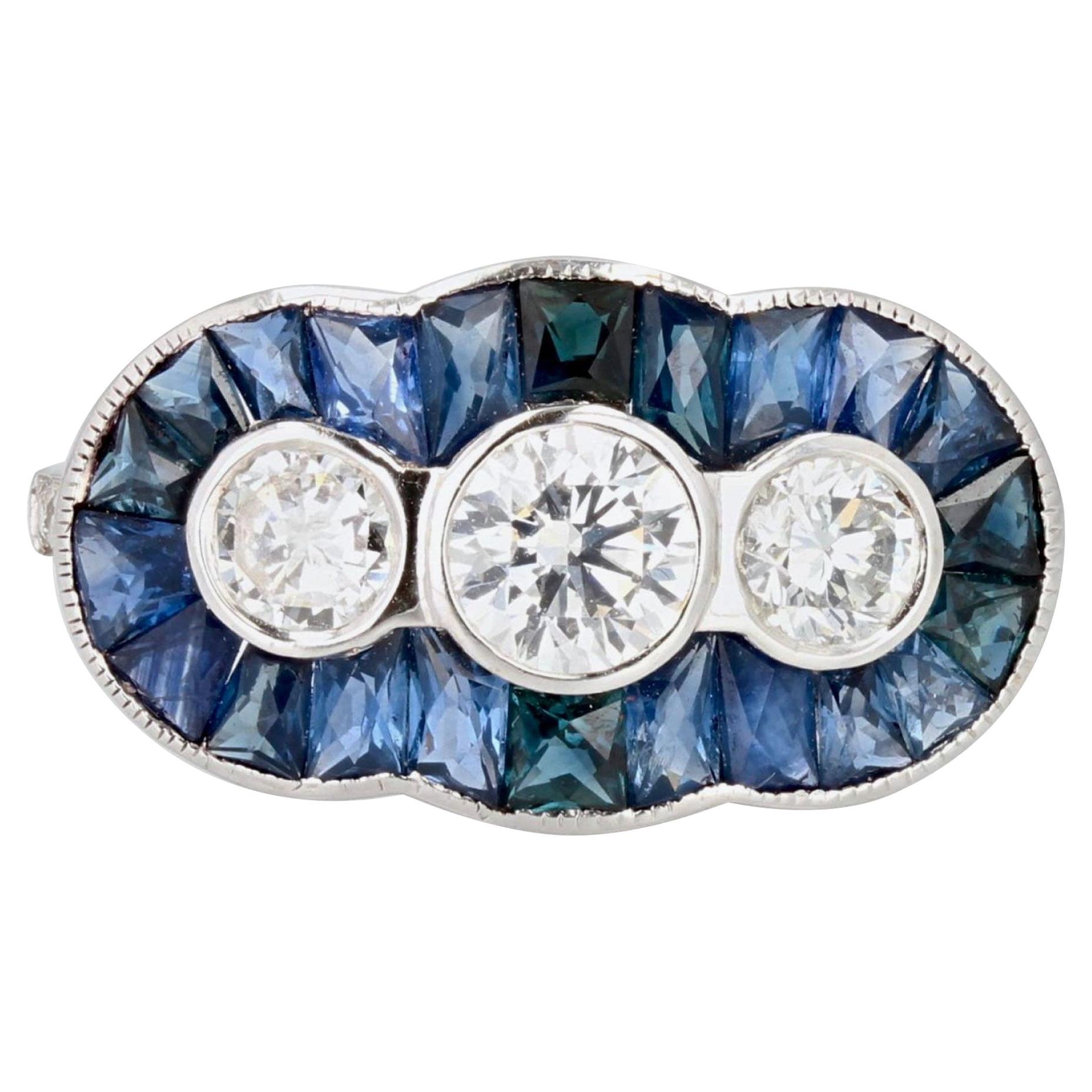 Bague de style Art dco en or blanc 18 carats avec saphirs calibrs et diamants
