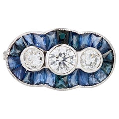 Ring aus 18 Karat Weigold mit Kaliber und Saphiren im Art-dco-Stil