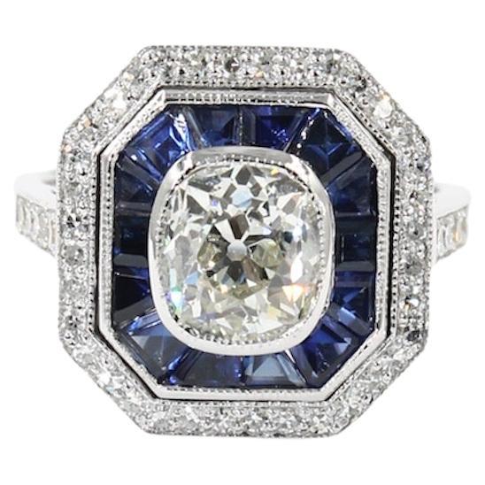 Art Deco Style Calibrated Sapphires and 1.38 Carats Old Mine Diamond Ring For Sale