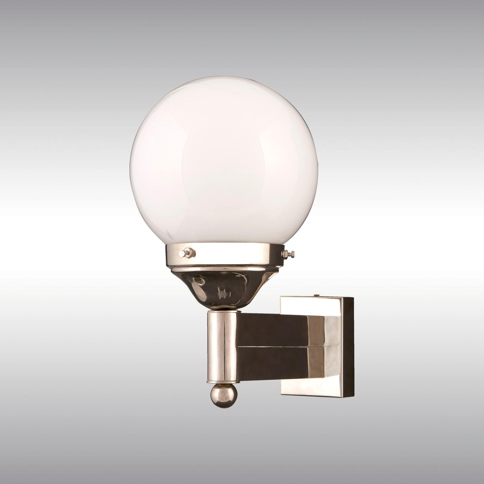 Wall light with opaline glass ball.

Most components according to the UL regulations, with an additional charge we will UL-list and label our fixtures.