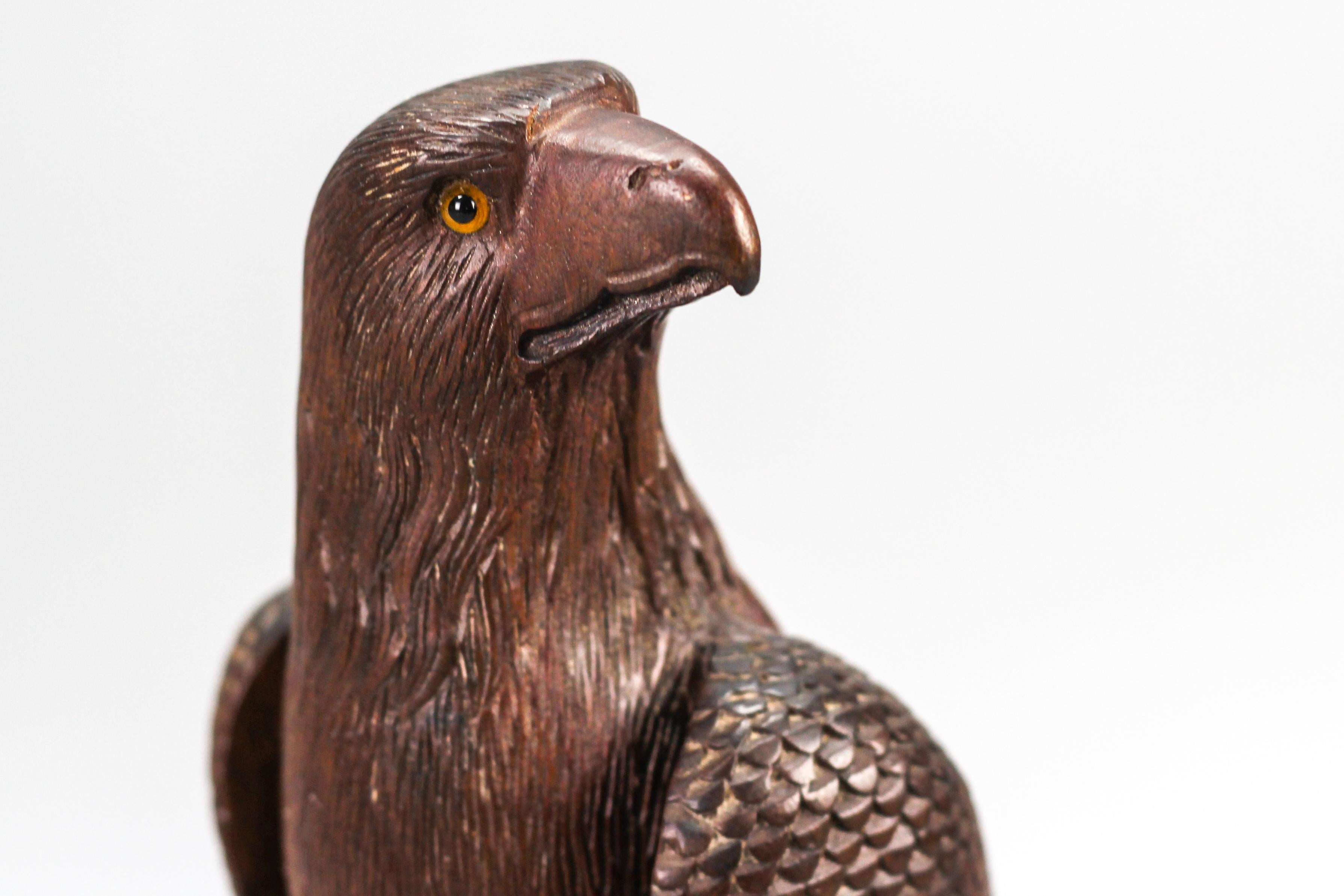 Mid-20th Century Art Deco Style Carved Wooden Eagle Sculpture with Glass Eyes For Sale