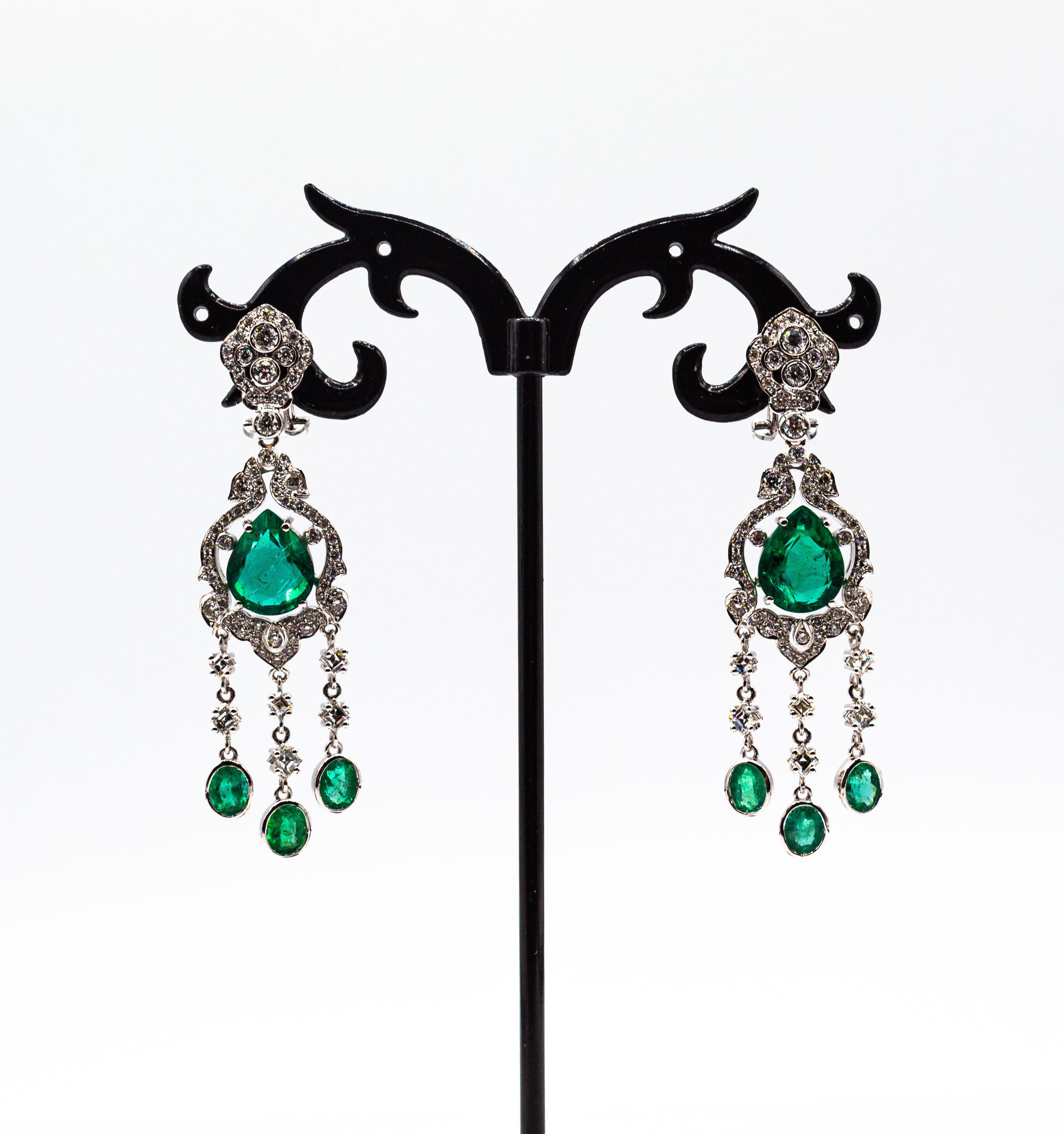 These Earrings are made of 18K White Gold.
These Earrings have 1.40 Carats of White Brilliant Cut Diamonds.
These Earrings have 0.77 Carats of White Princess Cut Diamonds.
These Earrings have 5.78 Carats of Certified Pear Cut Emeralds. (2.92ct +