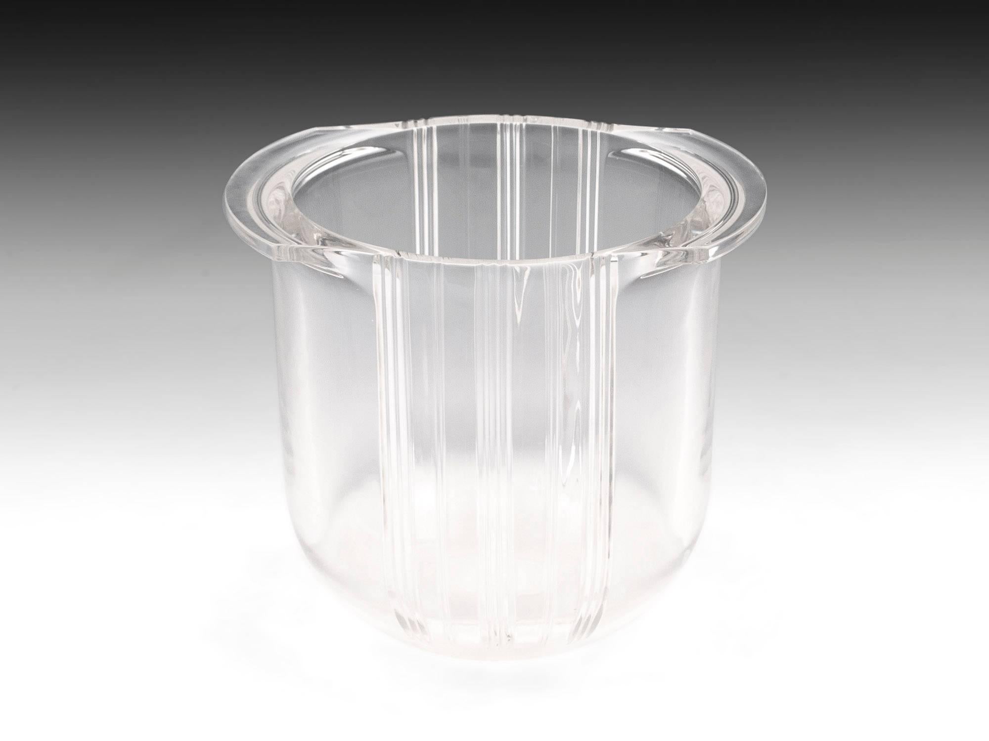 Art Deco style lead crystal glass champagne ice bucket by Christian Dior, with elegant cut-glass lines. 

The base of this super ice bucket is acid etched with the world famous name 
