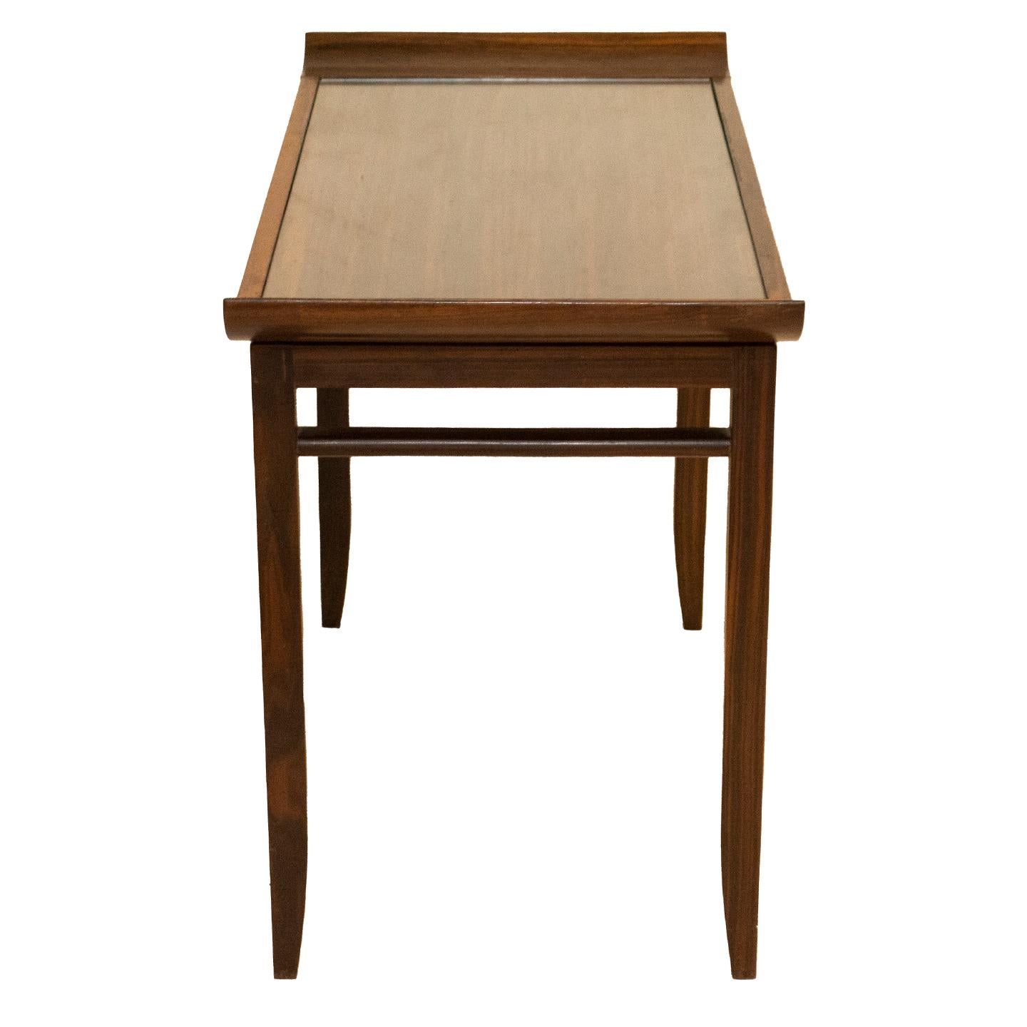 Exceptionally made tea table out of Circassian walnut. The graining of Circassian walnut is know for its dramatic. This tea table would double nicely cocktail table. Suitable for all interiors traditional to contemporary.