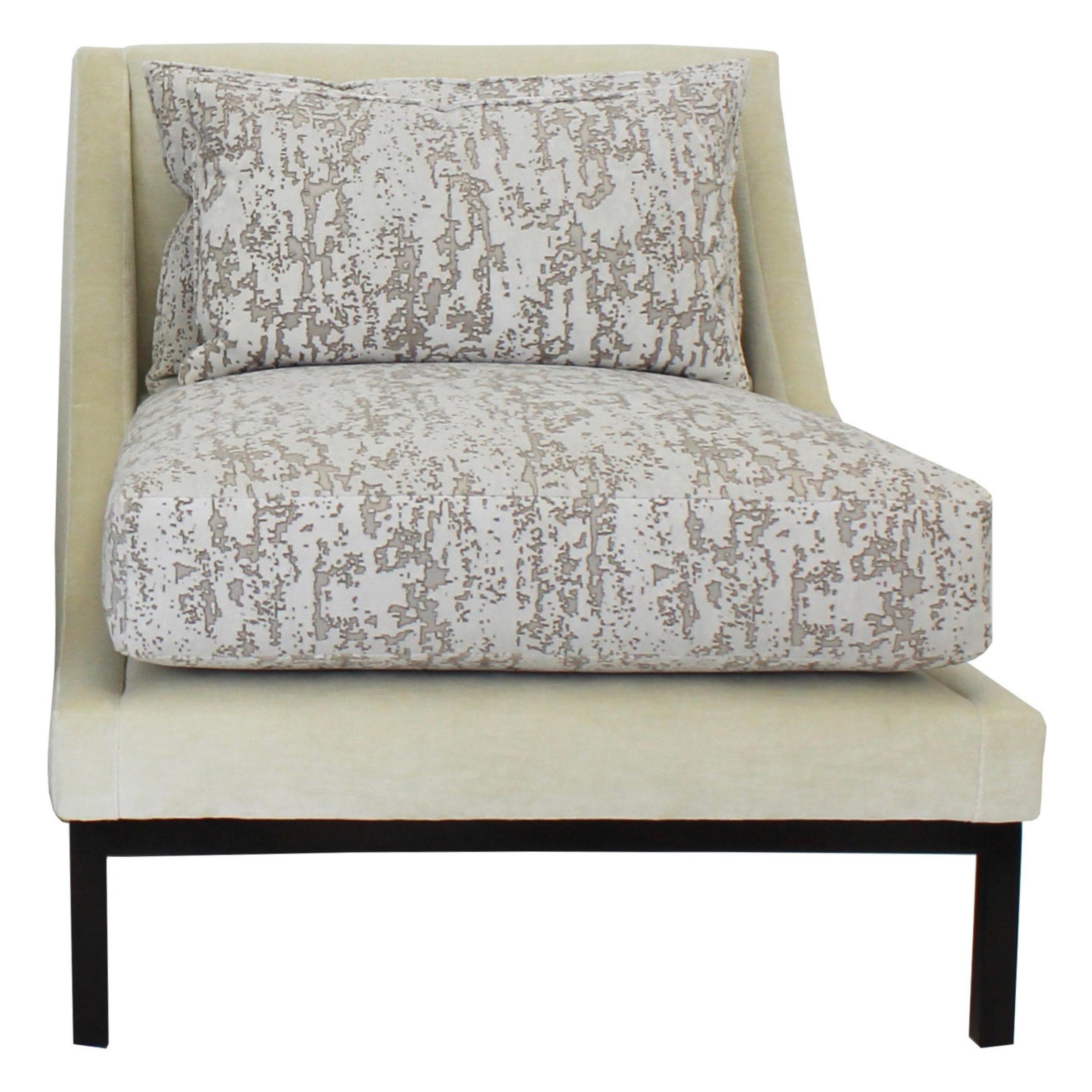 Art Deco inspired Club style chair features loose feather/down back and seat in feather/down wrapped foam. Shown in a Zinc jacquard velvet fabric with a unique burnt-out appearance and an abstract, textural design reminiscent of cork. The frame is