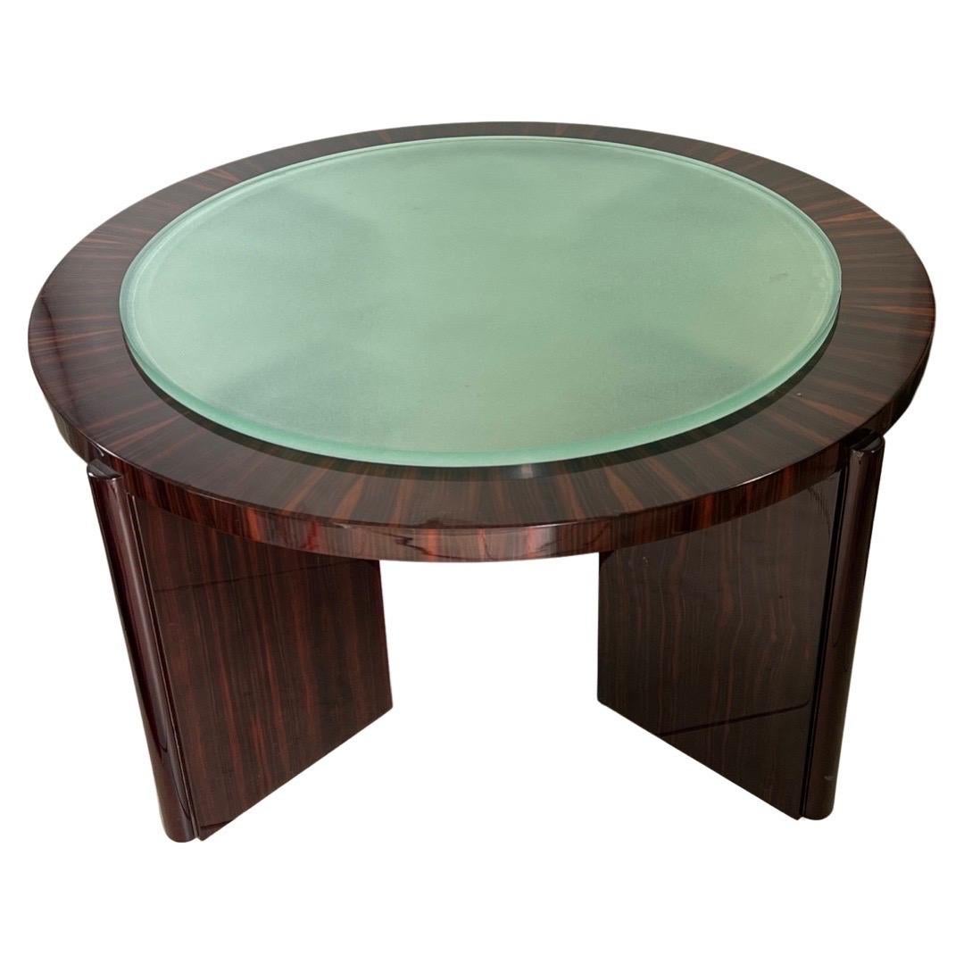 Art Deco Style coffee table in Makassar Ebony veneer upon a solid oak frame with a frosted glass top in the Dominique style.
Made in France.
Circa: 1990.