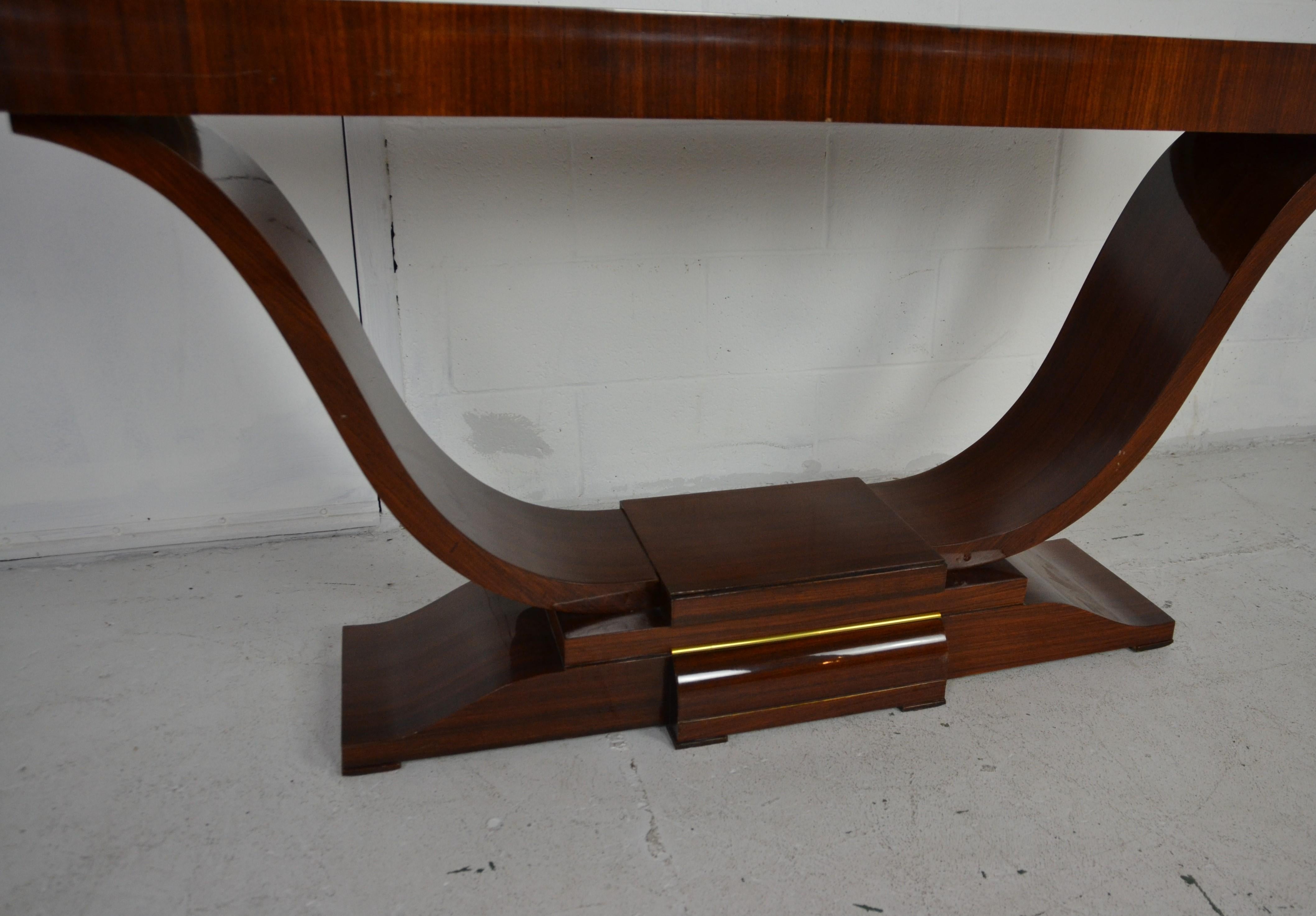 An Art Deco style console table in rosewood.