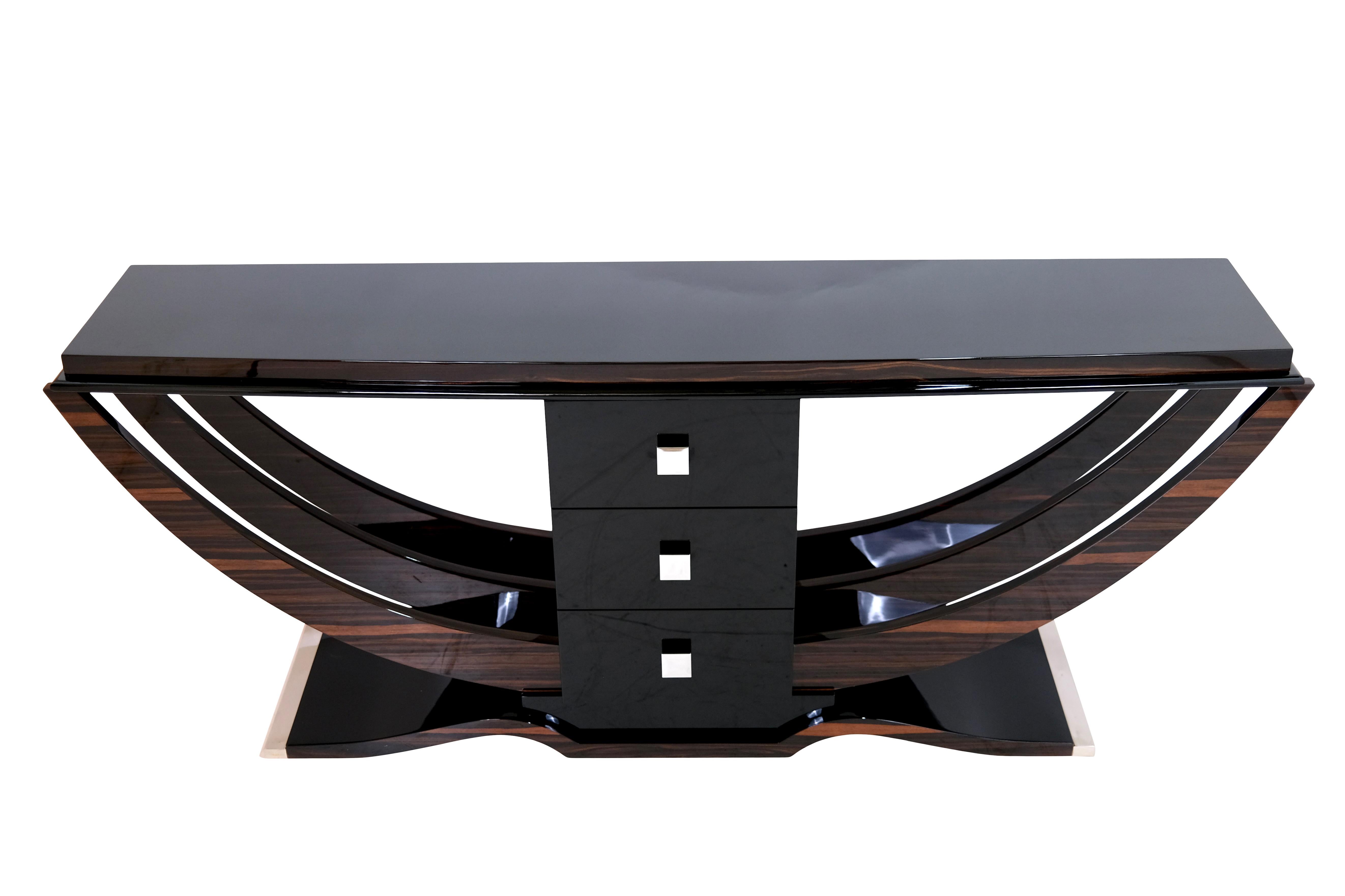 Console table 
Wood with Macassar Veneer and Black Piano Lacquer
high gloss lacquer finish

Contemporary furniture in the Art Déco style 

Other woods or finishes on request possible. 
We bild the furniture also in your desired dimensions in ca. 12