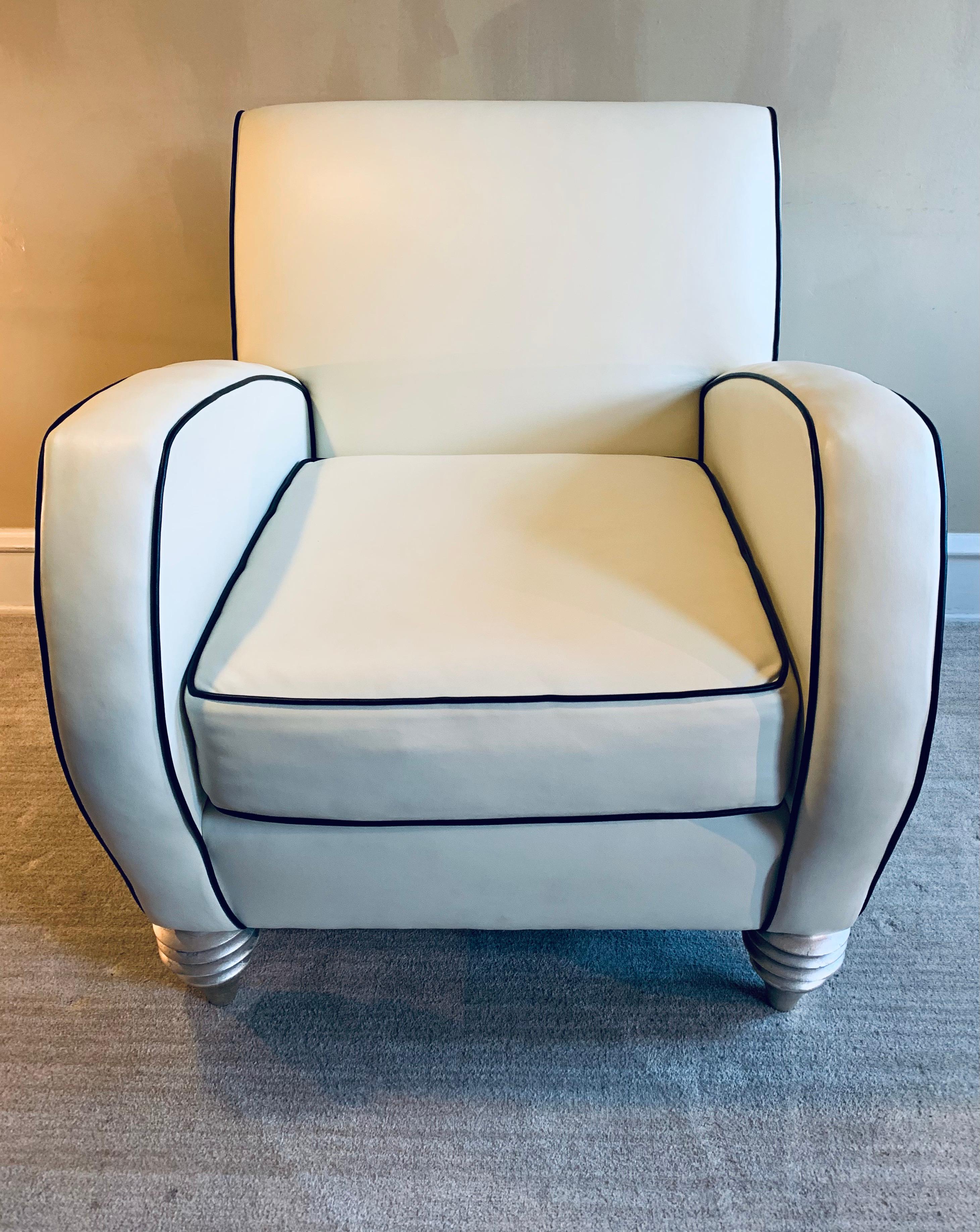 The most buttery leather club chair in ivory leather with black leather piping. 

Nary a child nor a pet has ever come close to this piece. It’s truly pristine. 

Additionally, it’s amazingly comfortable.