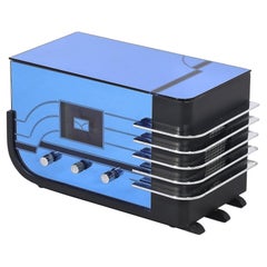 Estilo Art Déco Crosley CR38 Sleigh Radio en Cristal Azul y Cromo