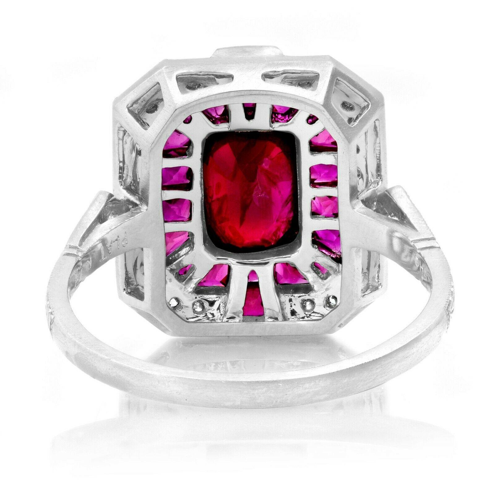 Ruby (1.53 CT center, 2.33 total carat weight) and diamond (0.24 total carat weight) antique inspired cocktail ring in 900 platinum. The ring is designed and handmade locally in Los Angeles by Sage Designs L.A. using earth-mined and conflict free