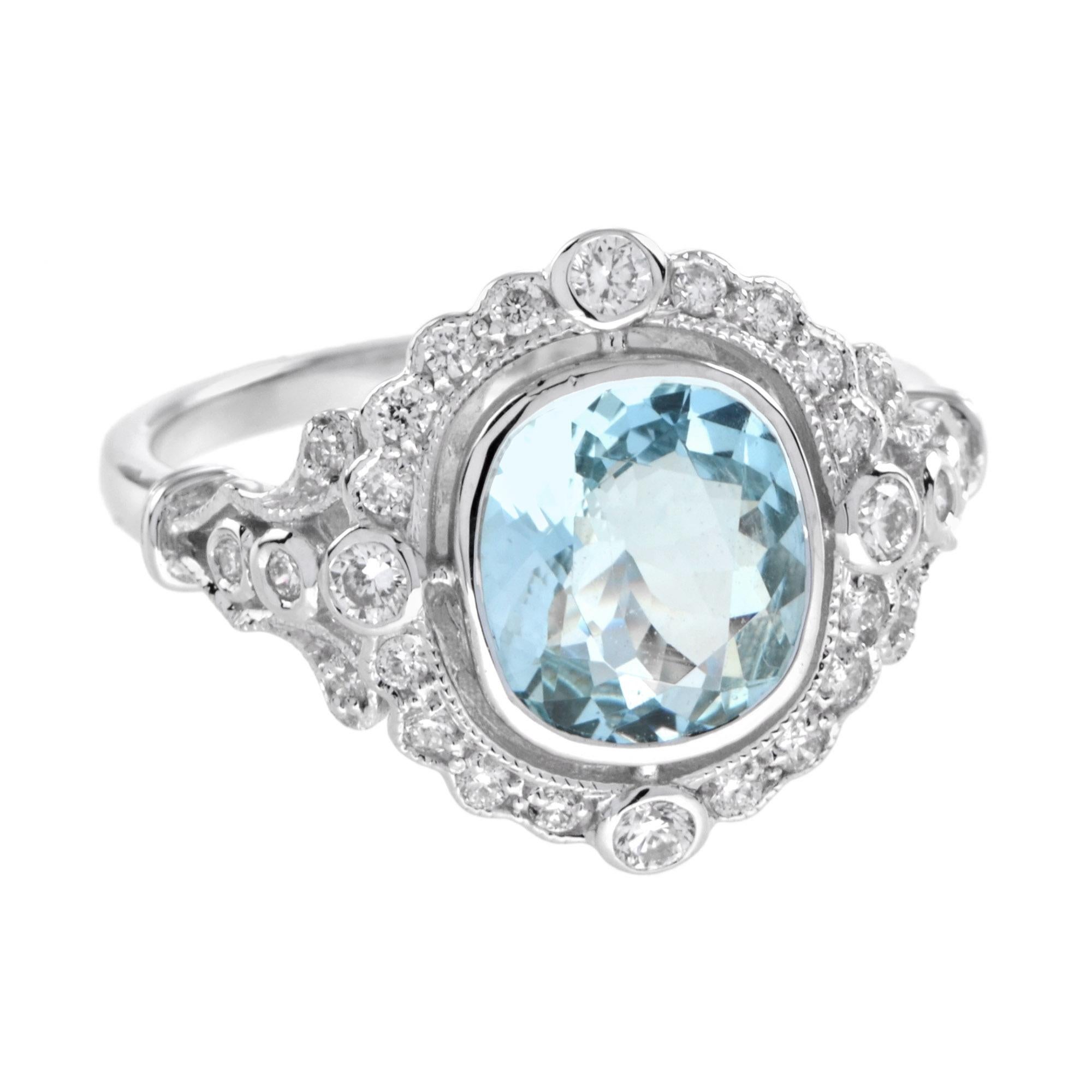 Dieser Verlobungsring im Art-Déco-Stil strahlt unverwechselbaren Glamour aus und verleiht jedem Look einen eleganten Glanz. Die Hauptattraktion ist ein prächtiger Aquamarin im Kissenschliff, der in einem Diamantkranz eingefasst ist. Dieser Ring