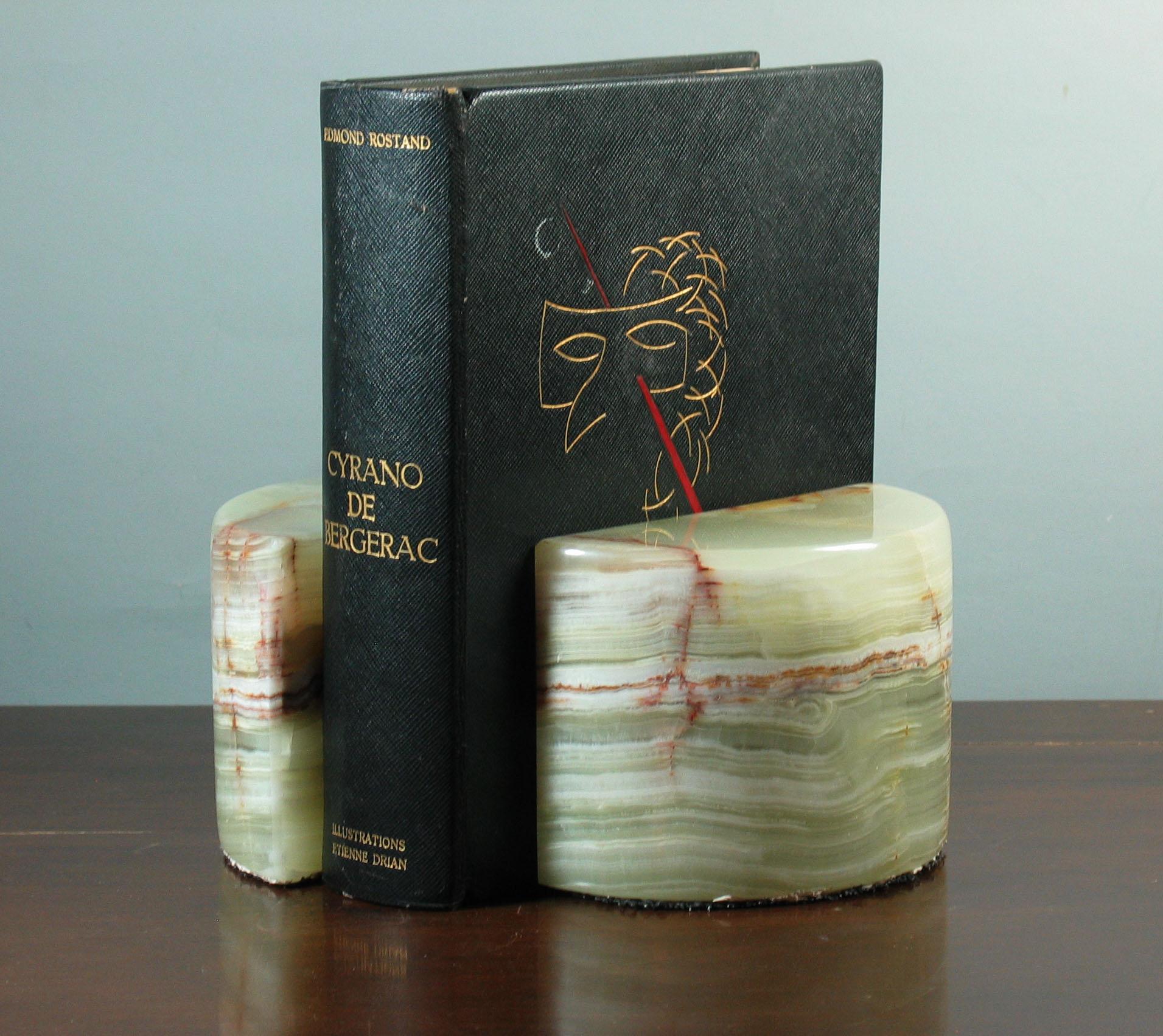 ART DECO STYLE DEMI-LUNE POLISHED
BANDED CALCITE BOOKENDS
Circa 1970

Pattern composed of natural celadon green and cream tones,
complete with distinct rust stiration bands.

Large and heavy
4