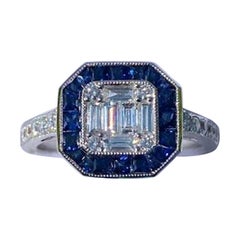 Art Deco Style Diamond and Blue Sapphire Calibre Cut 18 Karat White Gold Ring