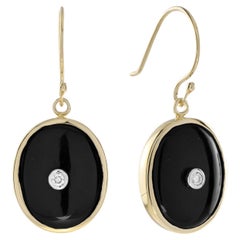 Boucles d'oreilles en goutte de style Art déco en or jaune 14 carats avec diamants et onyx de forme ovale