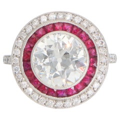 Bague double cible de style Art déco en platine avec diamants et rubis