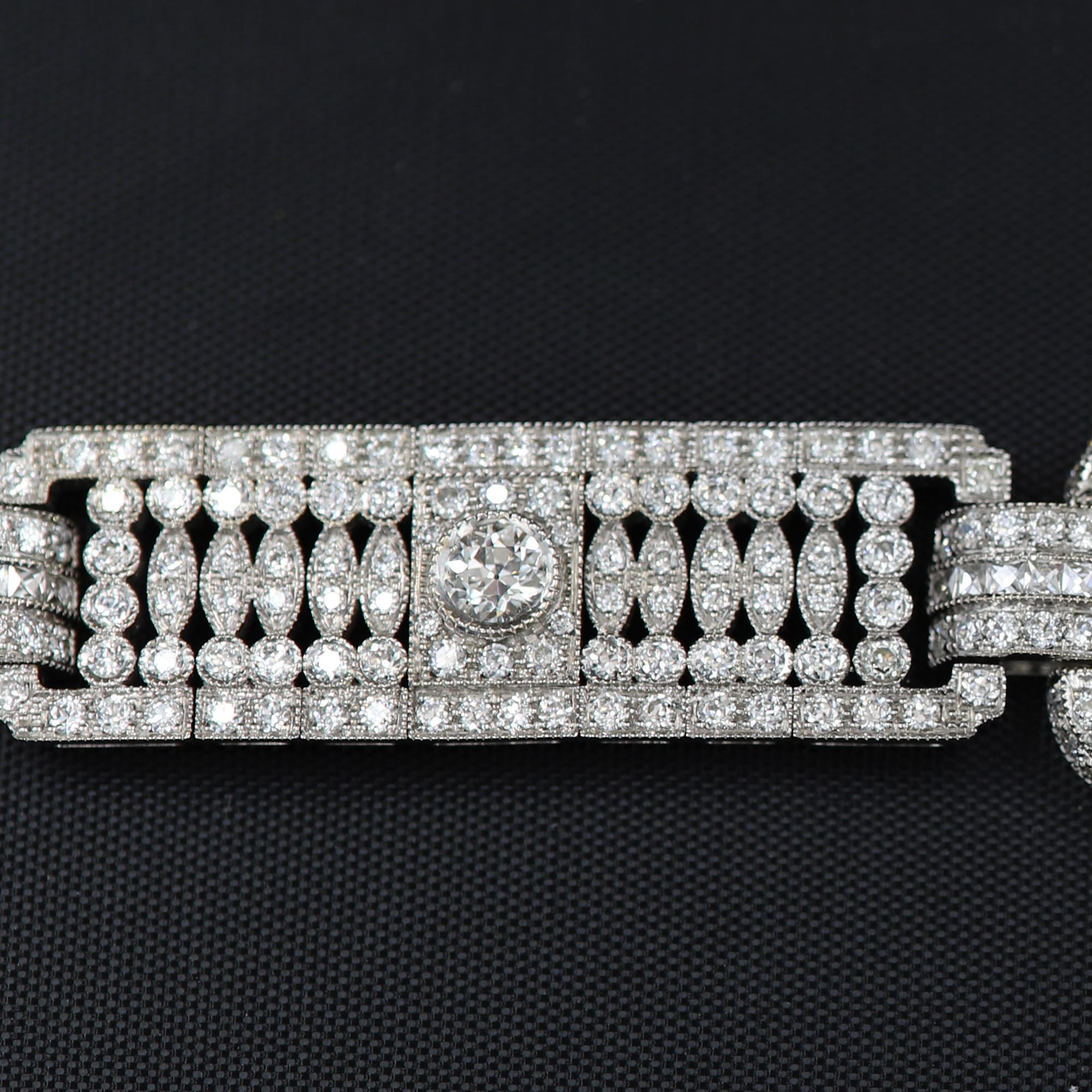 Art Deco Style, 
Impressive Statement Bold Bracelet.
With old Diamond-cut Diamonds
Total Diamonds 10.05 carat G-VS-SI
18k White Gold 55 grams
Bracelet Width 14 mm