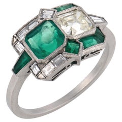 Art Deco style diamond emerald platinum toi et moi ring