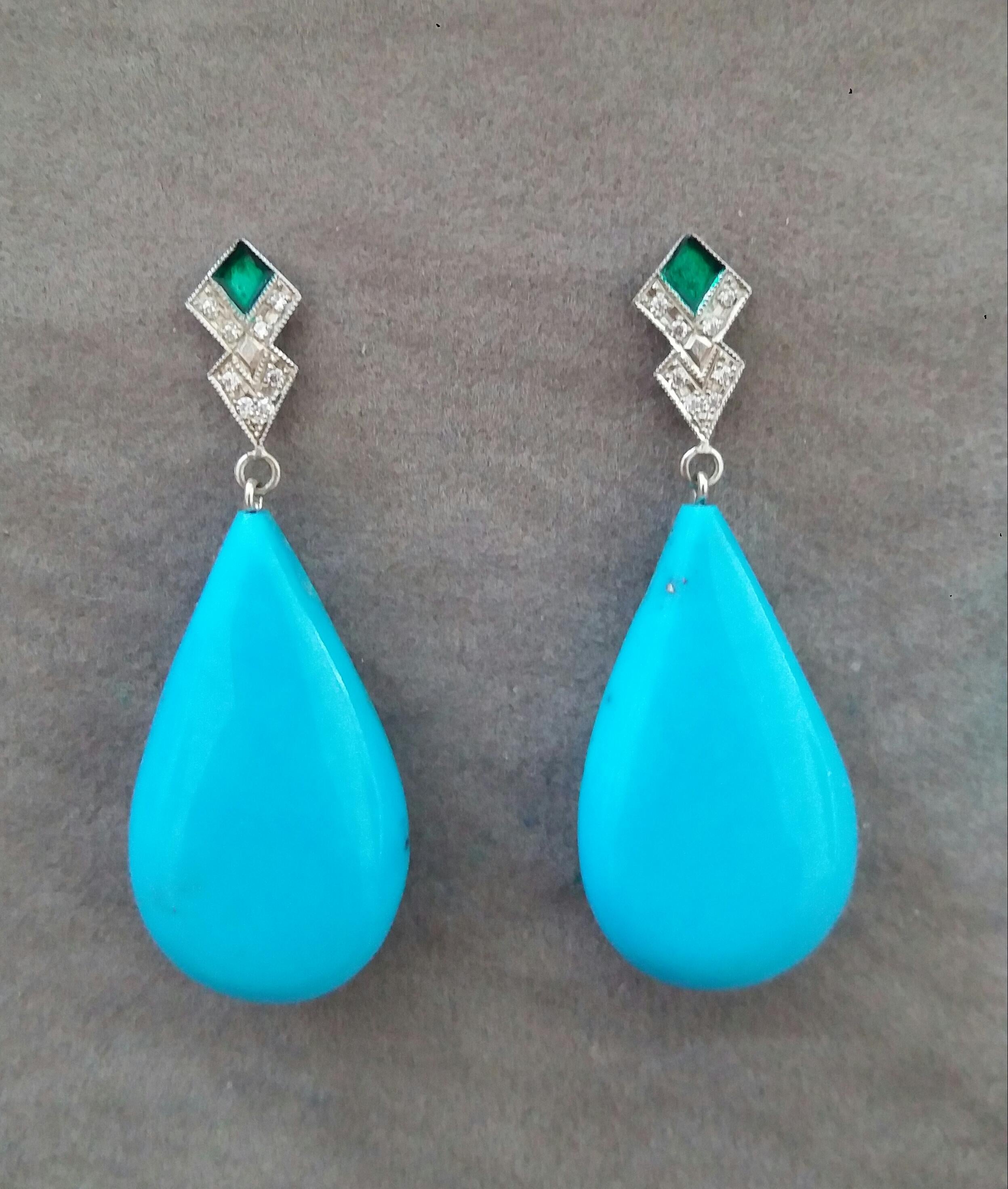 In these classic Art Deco Style earrings the tops are 2 elements  in 14 kt. white gold, 16 round full cut diamonds and Green Enamel,,in the lower parts we have 2 Natural Turquoise Plain Drops   measuring 17 x 30 mm 
These earrings will arrive at