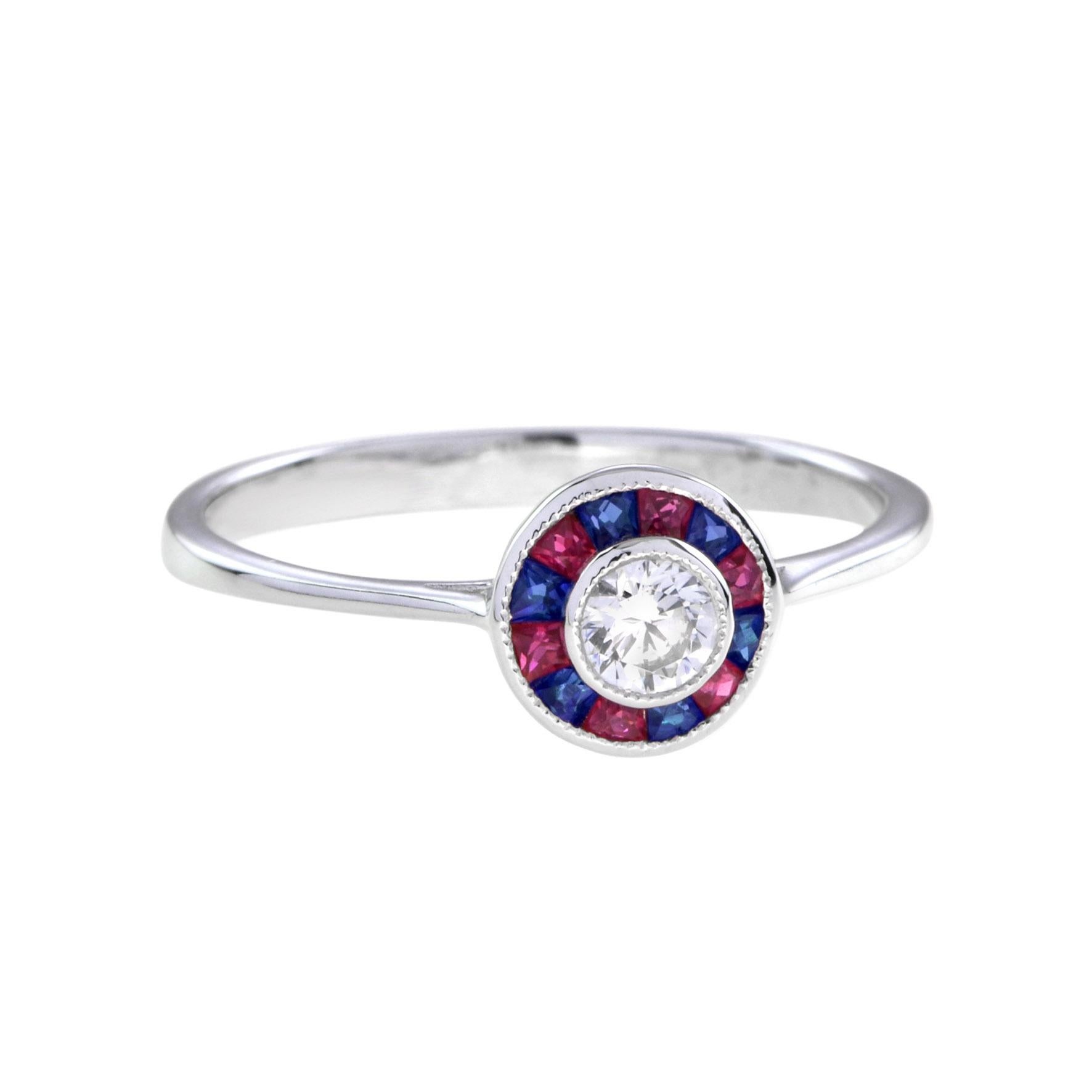 A diamond with ruby and sapphire target ring, rub-over-set to the center with a round brilliant cut diamond surrounded by French cut rubies and sapphires, all set in 18k gold. A gorgeous diamond with ruby and sapphire target ring, made in the style
