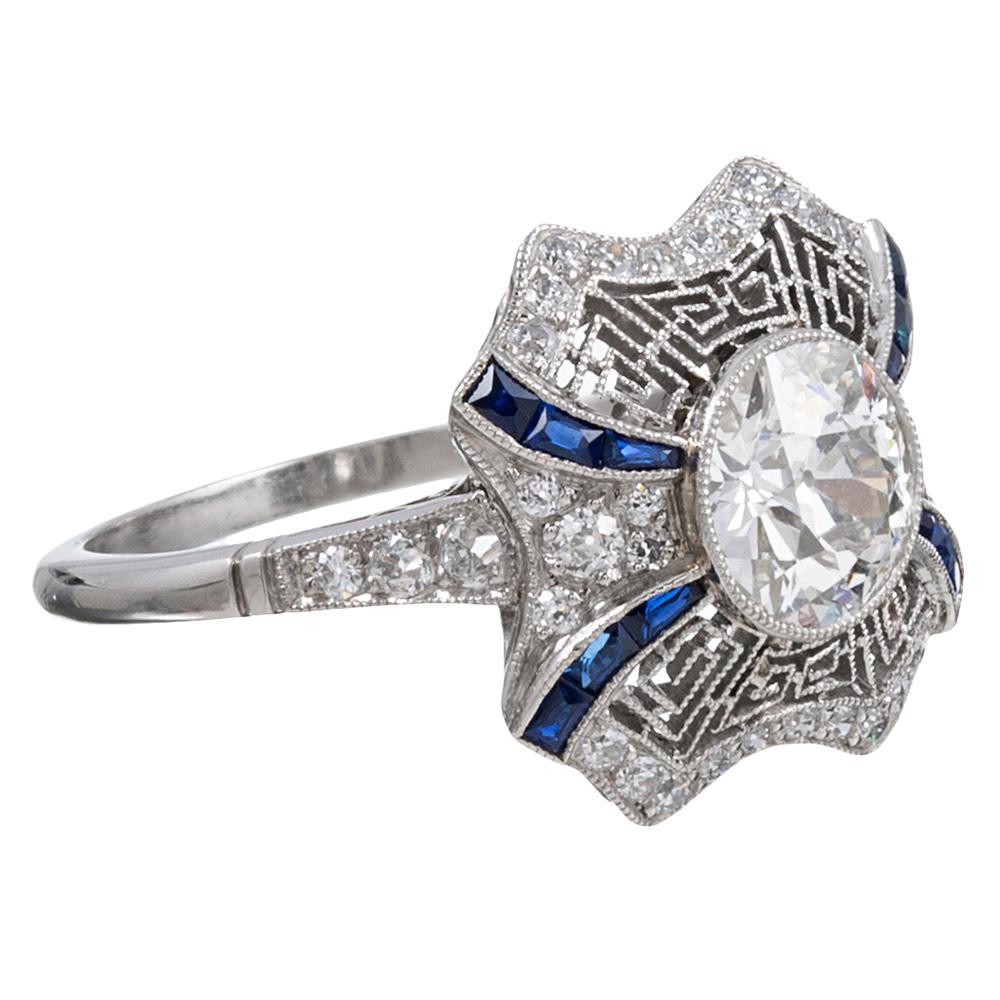 This ring is hand made in platinum in the tradition of original art deco style. Such quality of manufacture is difficult to achieve. Note the highly intricate design with geometric filigree, mill grain, a very finely decorated under gallery and