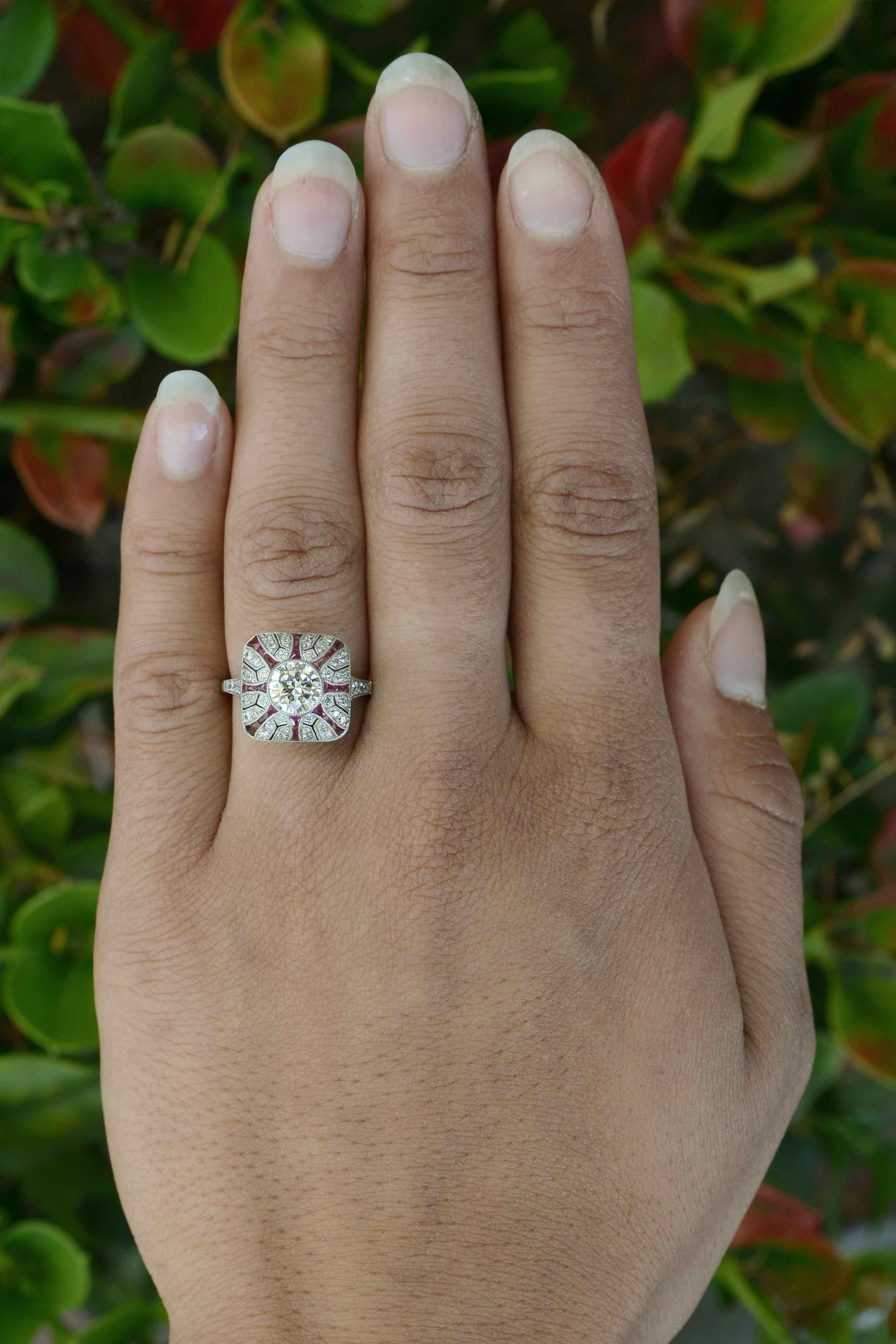 A timeless Art Deco revival style, with a micro mosaic ruby dome that is most mesmerizing and detailed. Fashioned as a bombe dome and set with a near 1 carat diamond it glistens with a captivating brilliance and sparkle that refract just from the